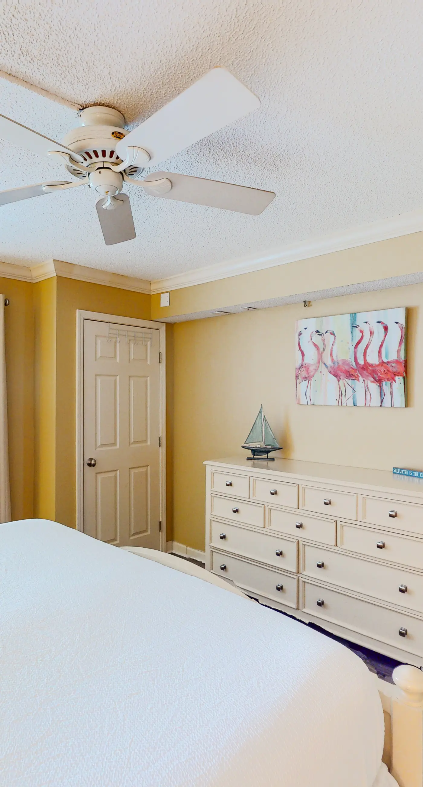 Beachfront condo with ocean-view balcony, pools, hot tub, gym, central AC, & W/D