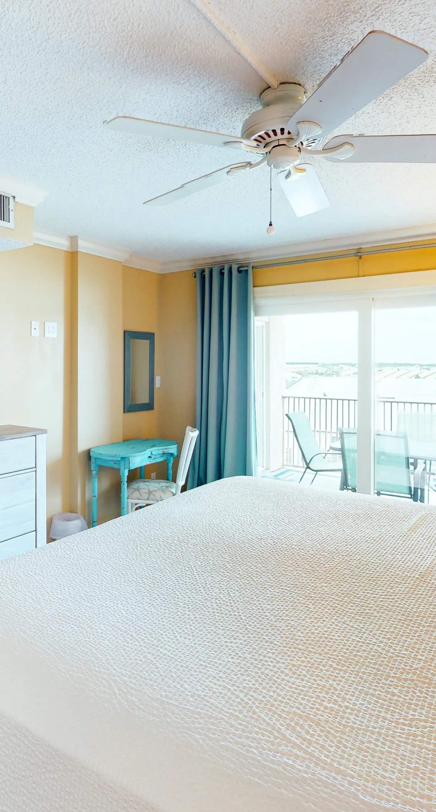 Beachfront condo with ocean-view balcony, pools, hot tub, gym, central AC, & W/D