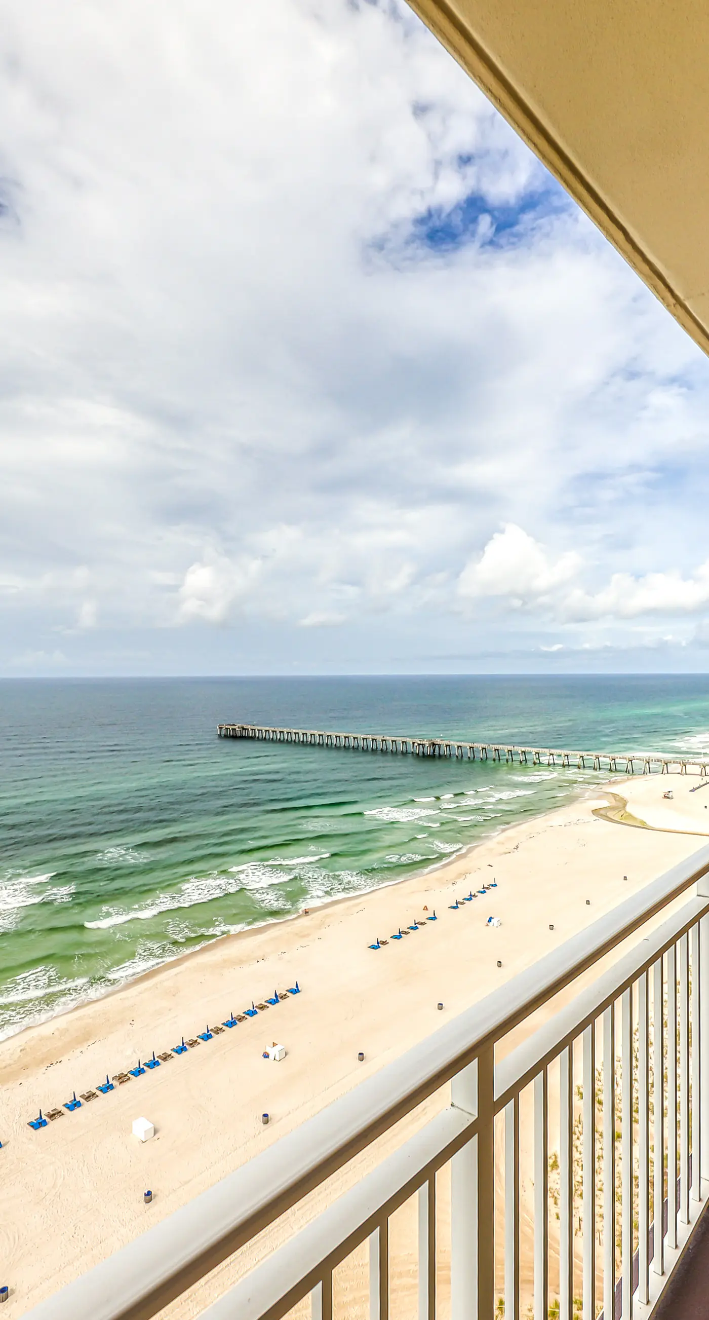 Beach getaway steps from the beach with pool & gym