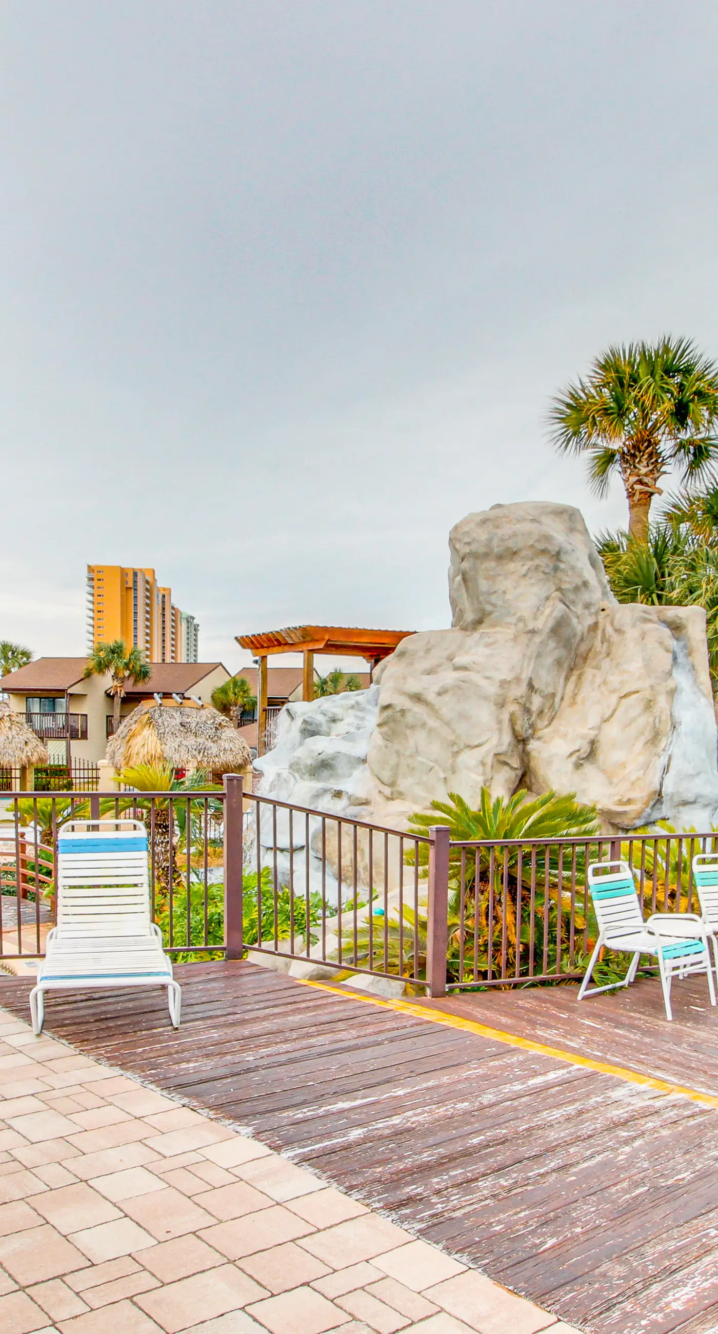 Resort condo with balcony, pools, hot tub & gym - near beach