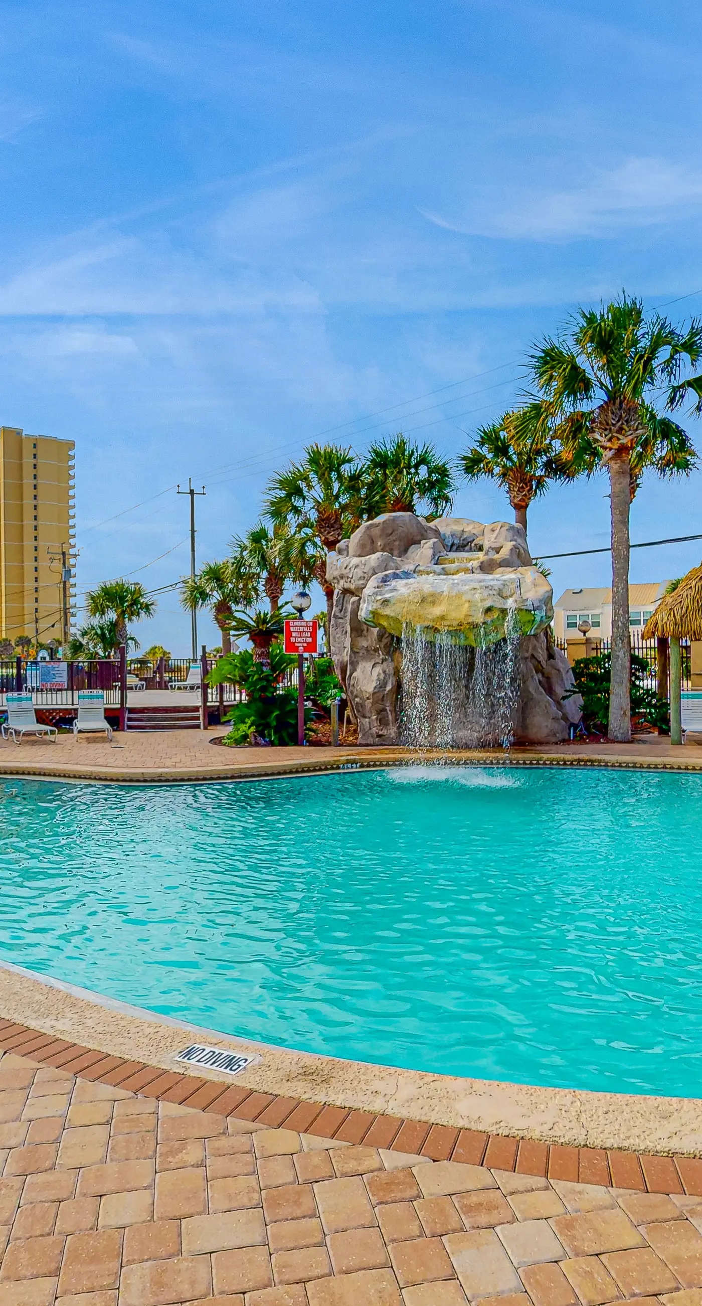 Resort condo with balcony, pools, hot tub & gym - near beach