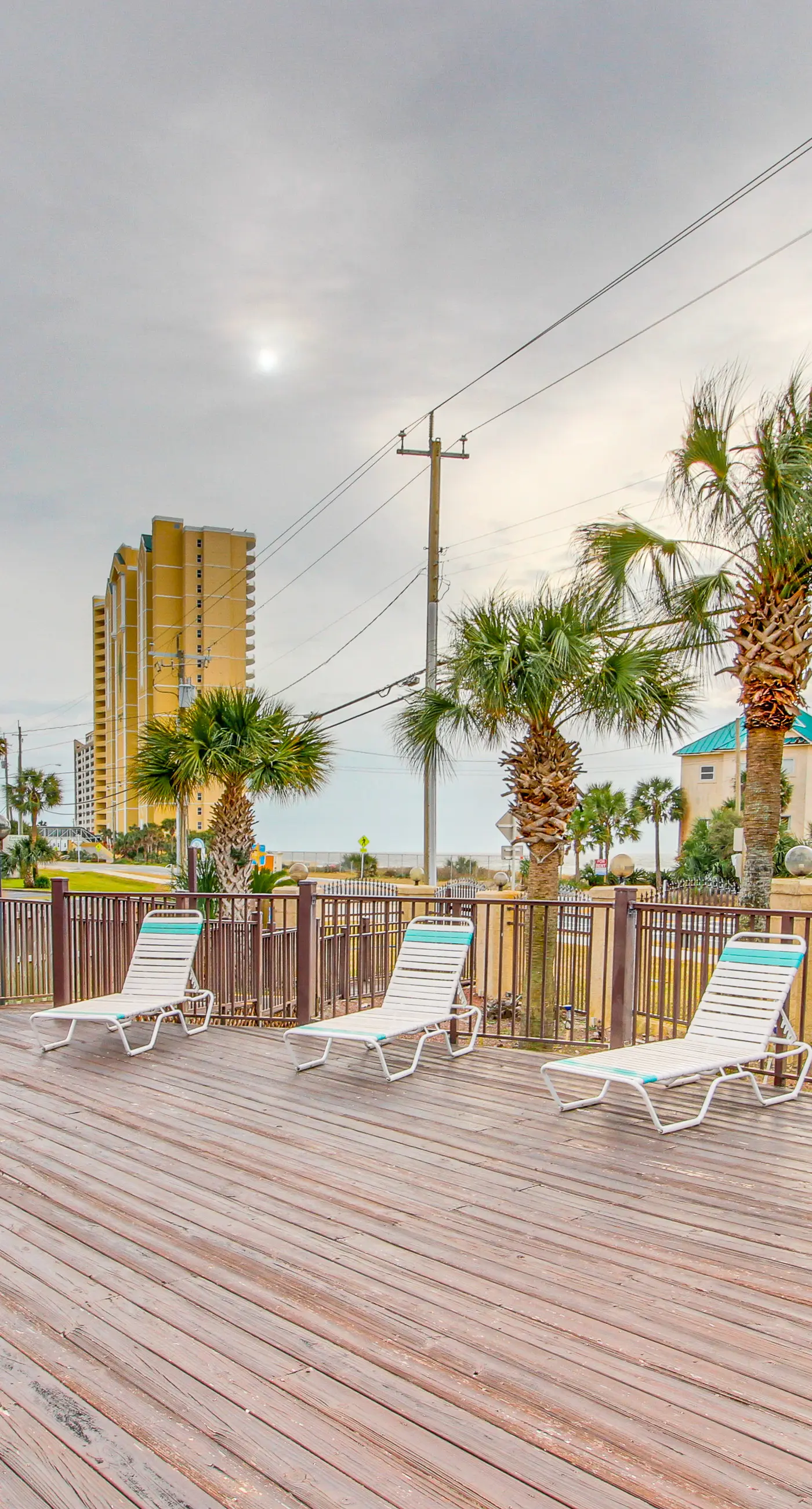 Resort condo with balcony, pools, hot tub & gym - near beach
