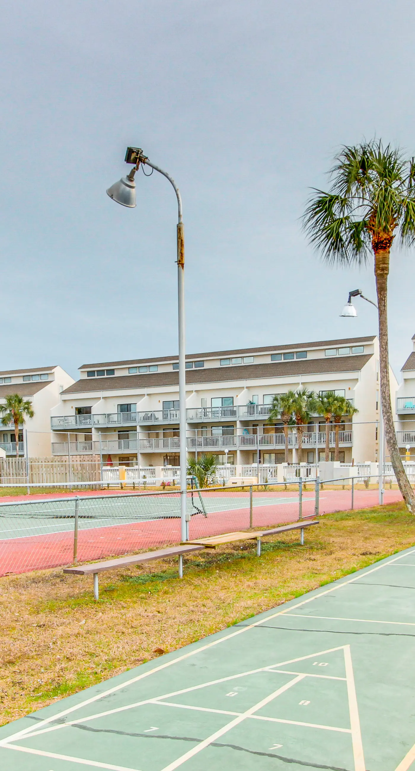 Resort condo with balcony, pools, hot tub & gym - near beach