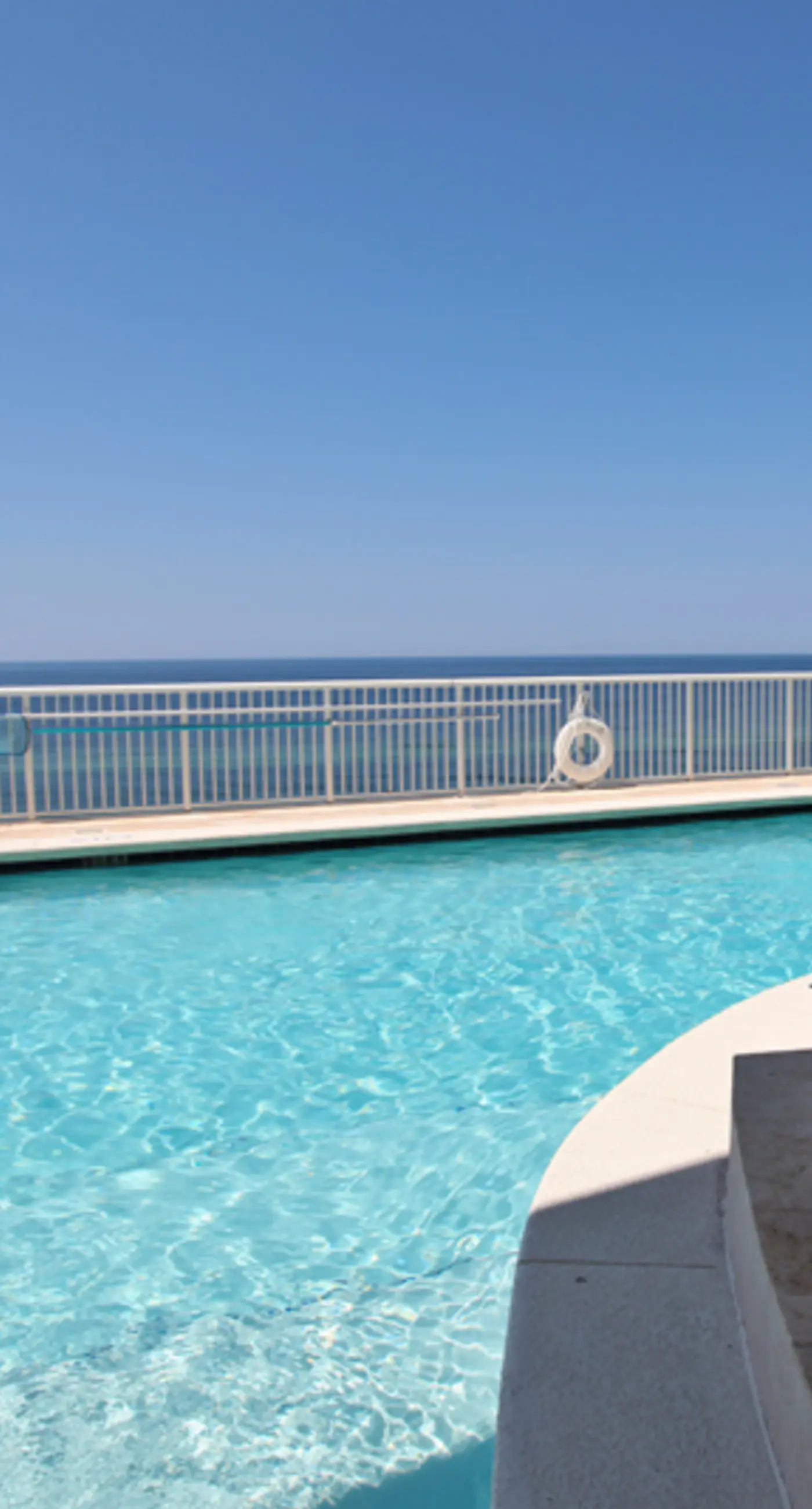 Modern, Gulf-front condo with pool, hot tub & high-speed WiFi