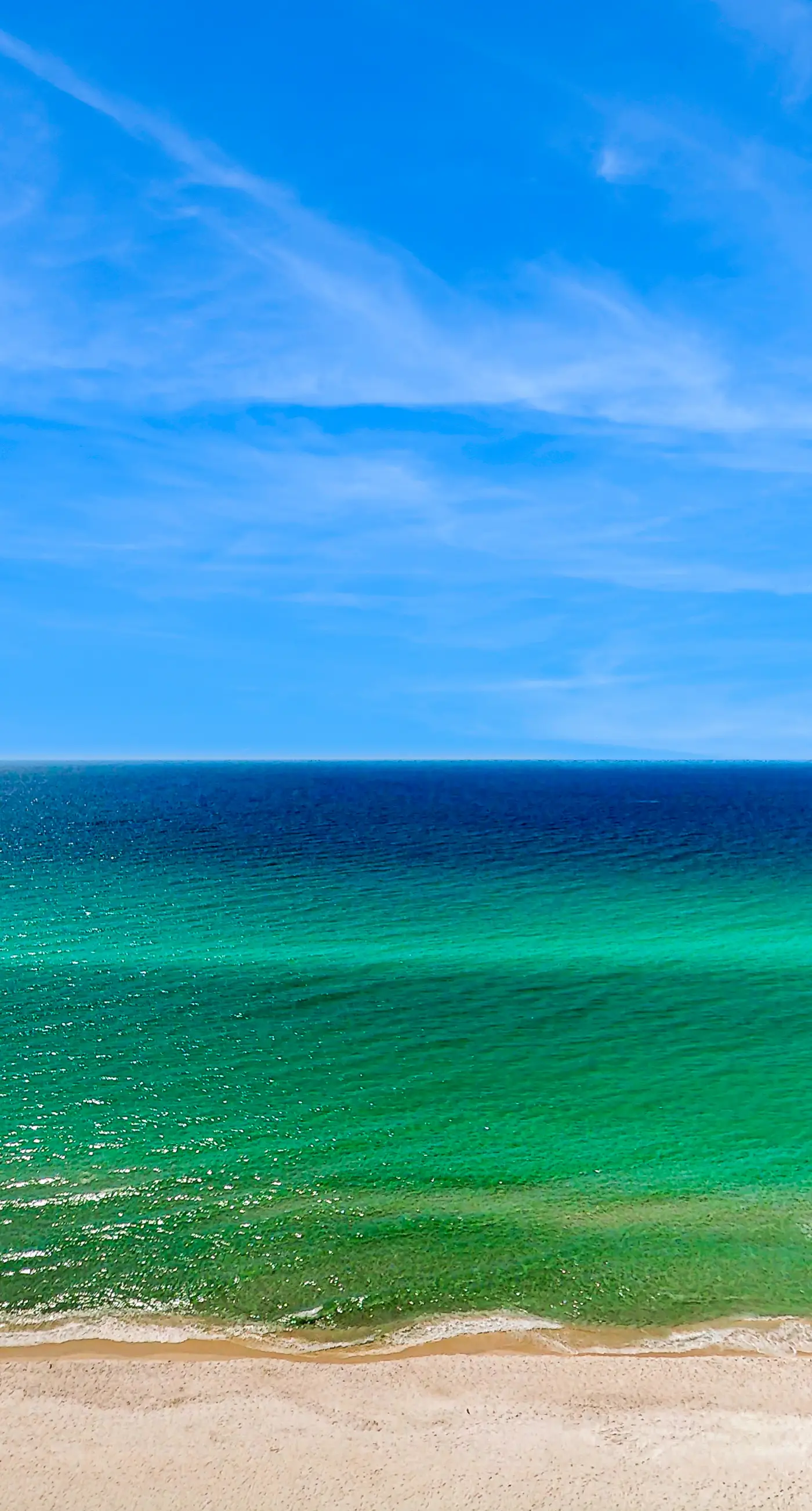 Modern, Gulf-front condo with pool, hot tub & high-speed WiFi