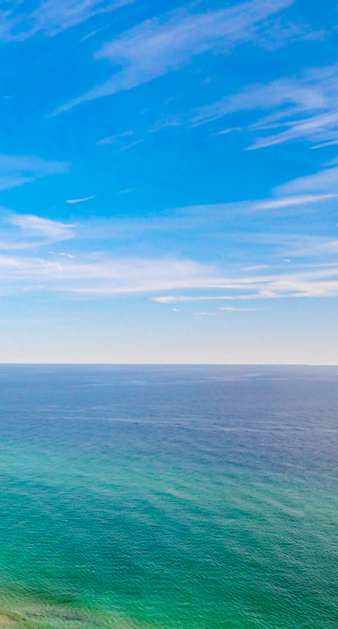 Modern, Gulf-front condo with pool, hot tub & high-speed WiFi