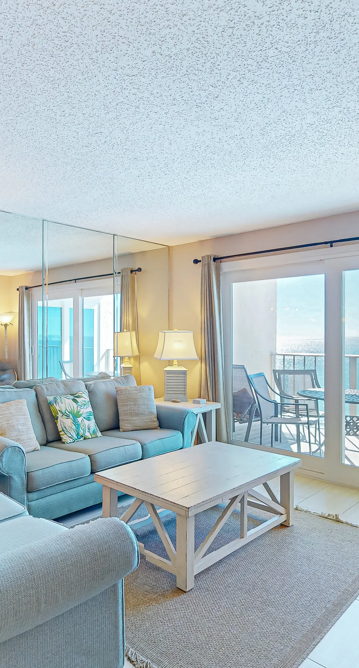 Stunning beachfront condo w/ beach access, shared pool, & private balcony