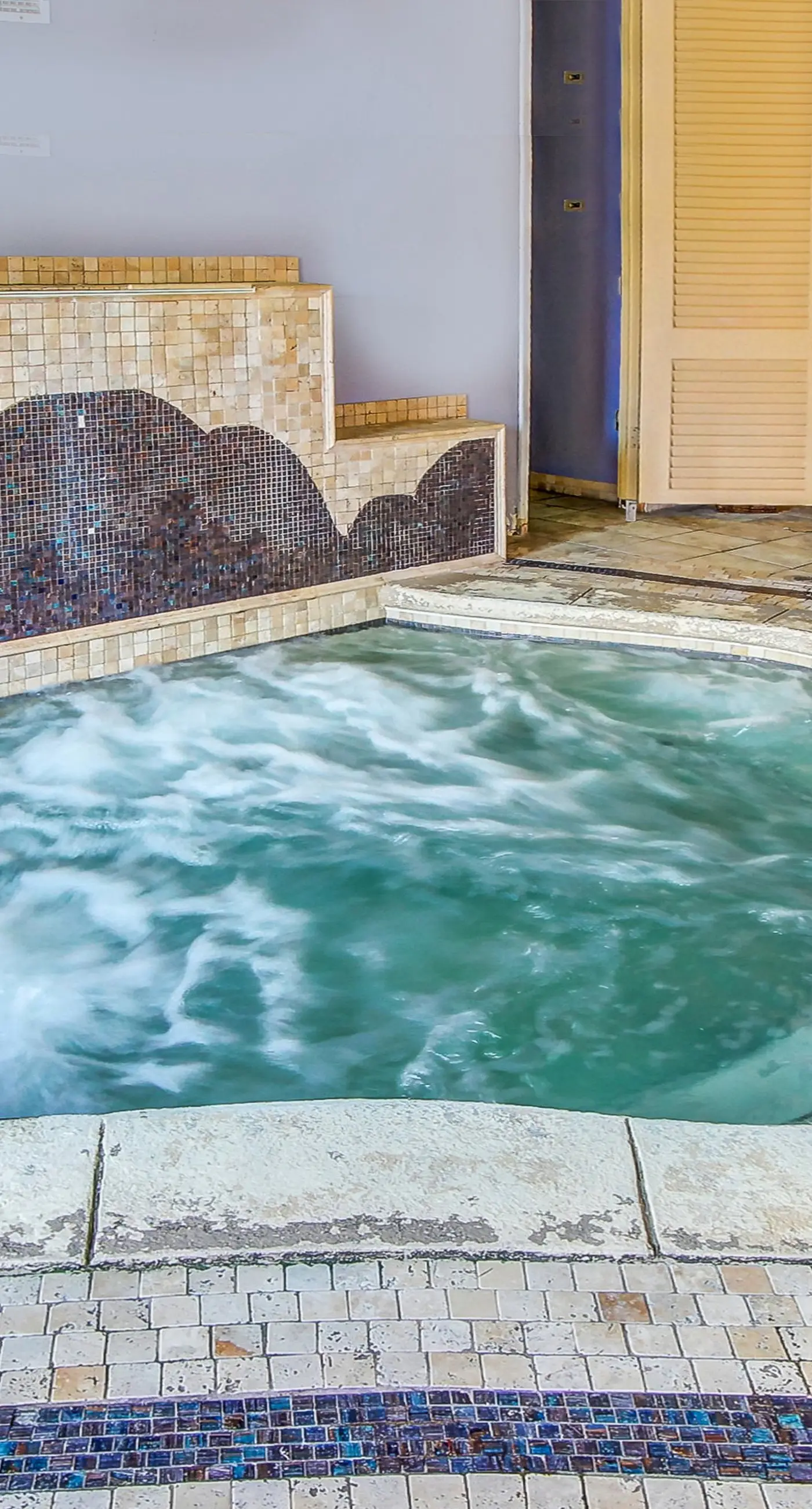 Stunning beachfront condo w/ beach access, shared pool, & private balcony