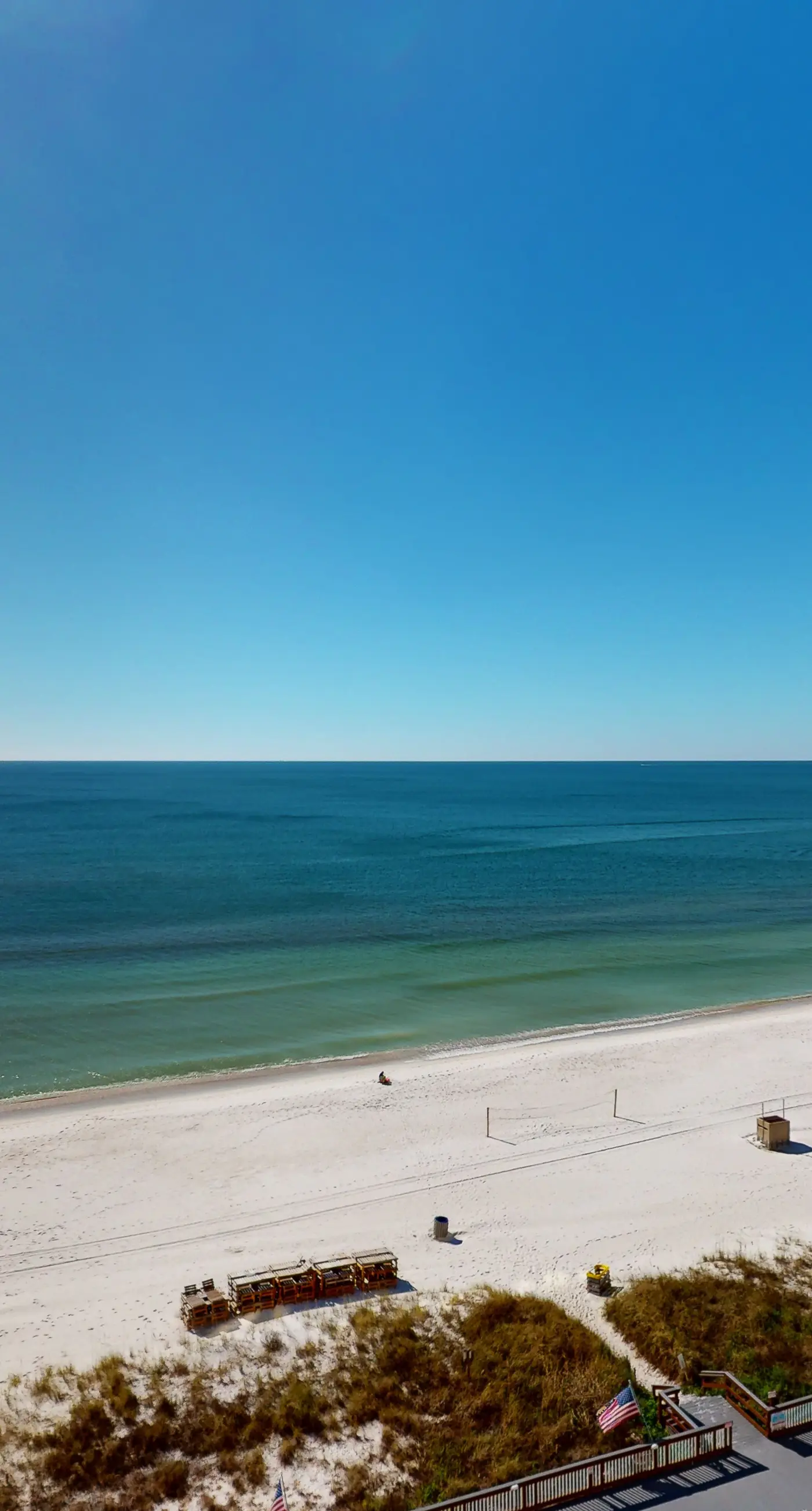 Stunning beachfront condo w/ beach access, shared pool, & private balcony