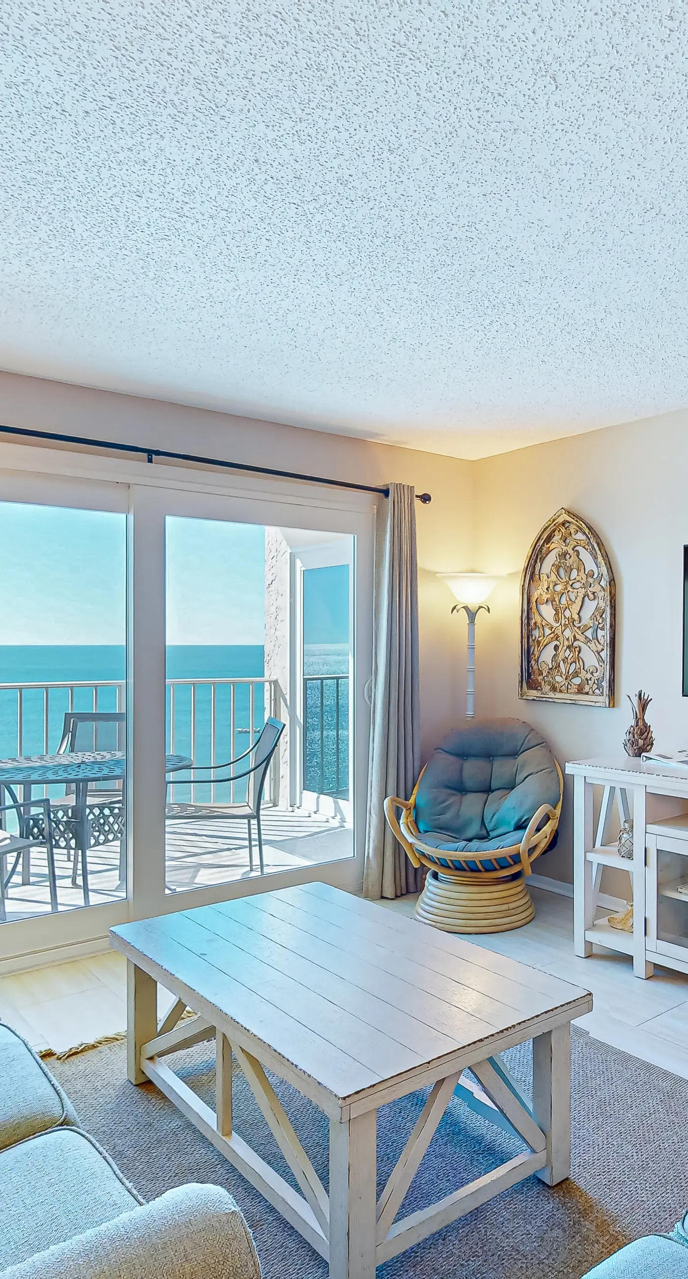 Stunning beachfront condo w/ beach access, shared pool, & private balcony