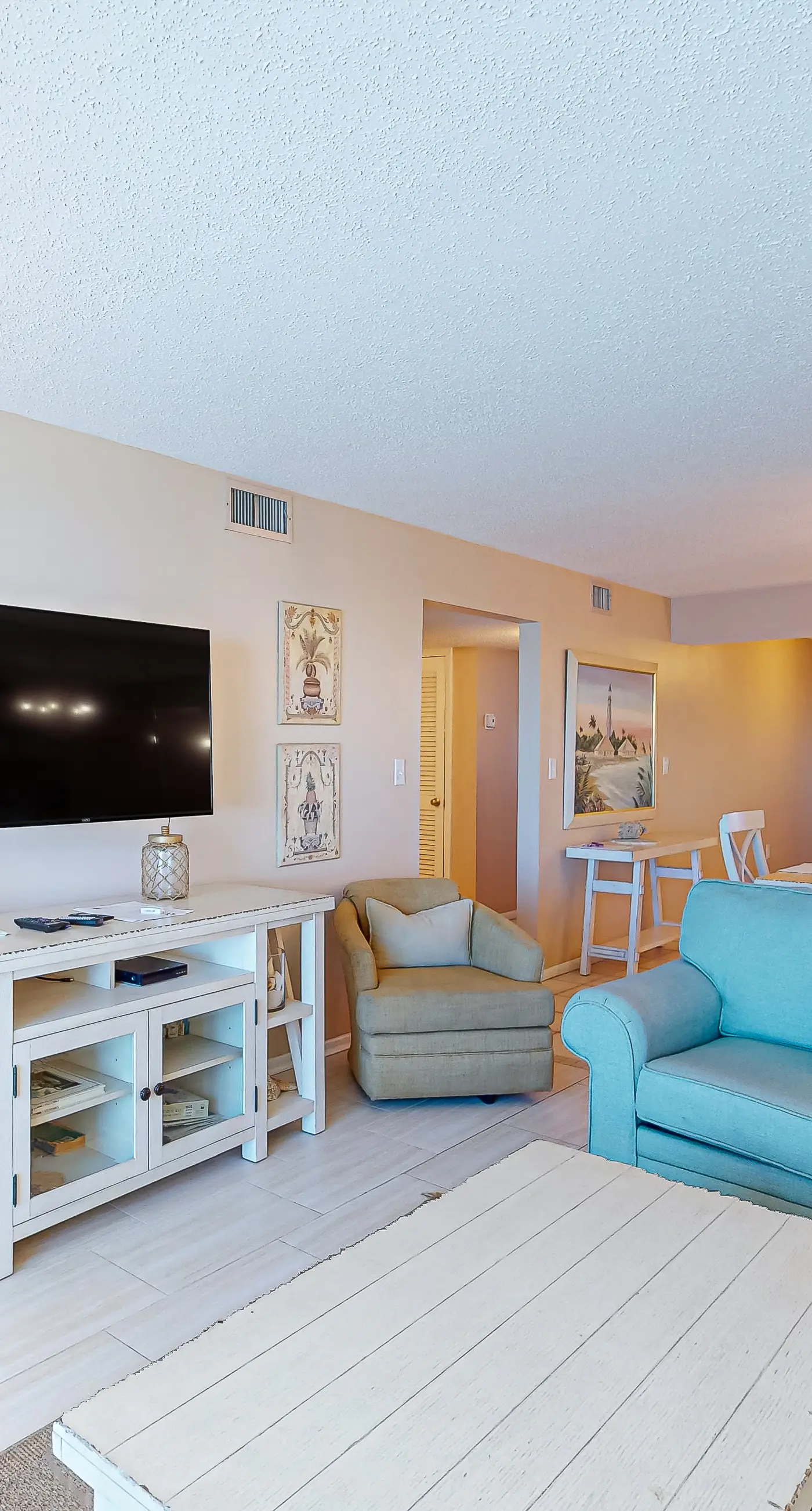 Stunning beachfront condo w/ beach access, shared pool, & private balcony