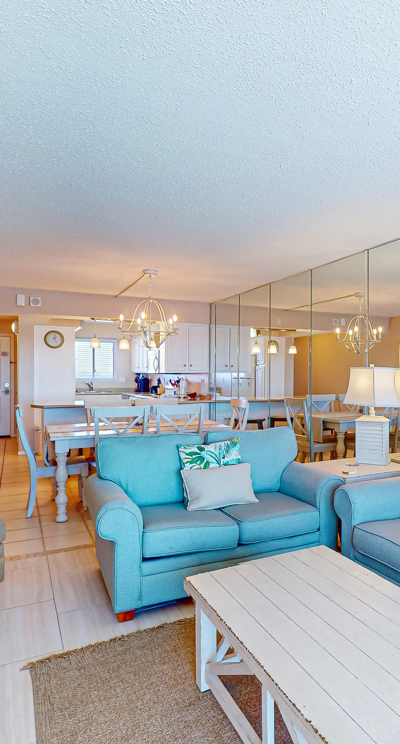 Stunning beachfront condo w/ beach access, shared pool, & private balcony