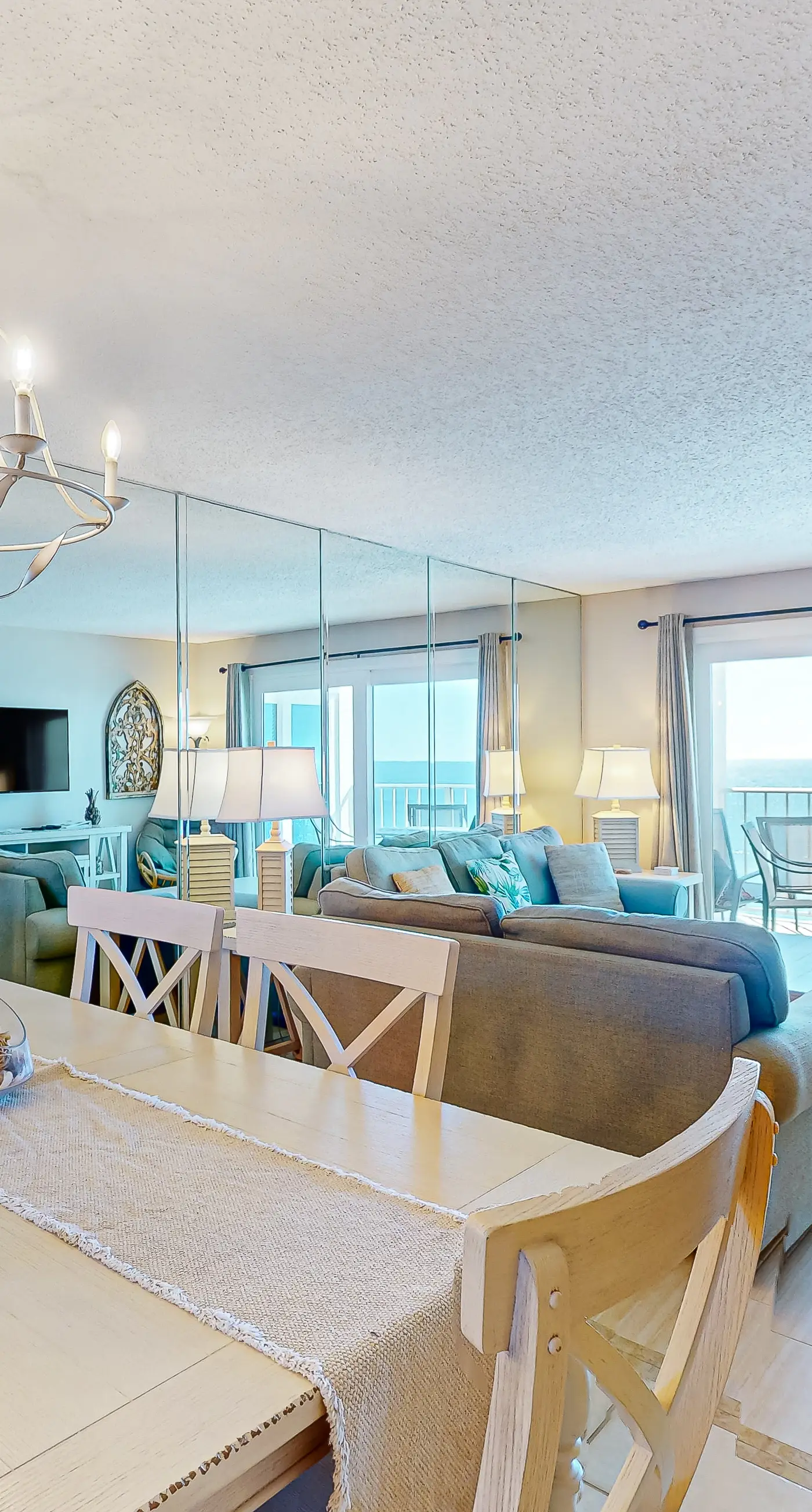 Stunning beachfront condo w/ beach access, shared pool, & private balcony