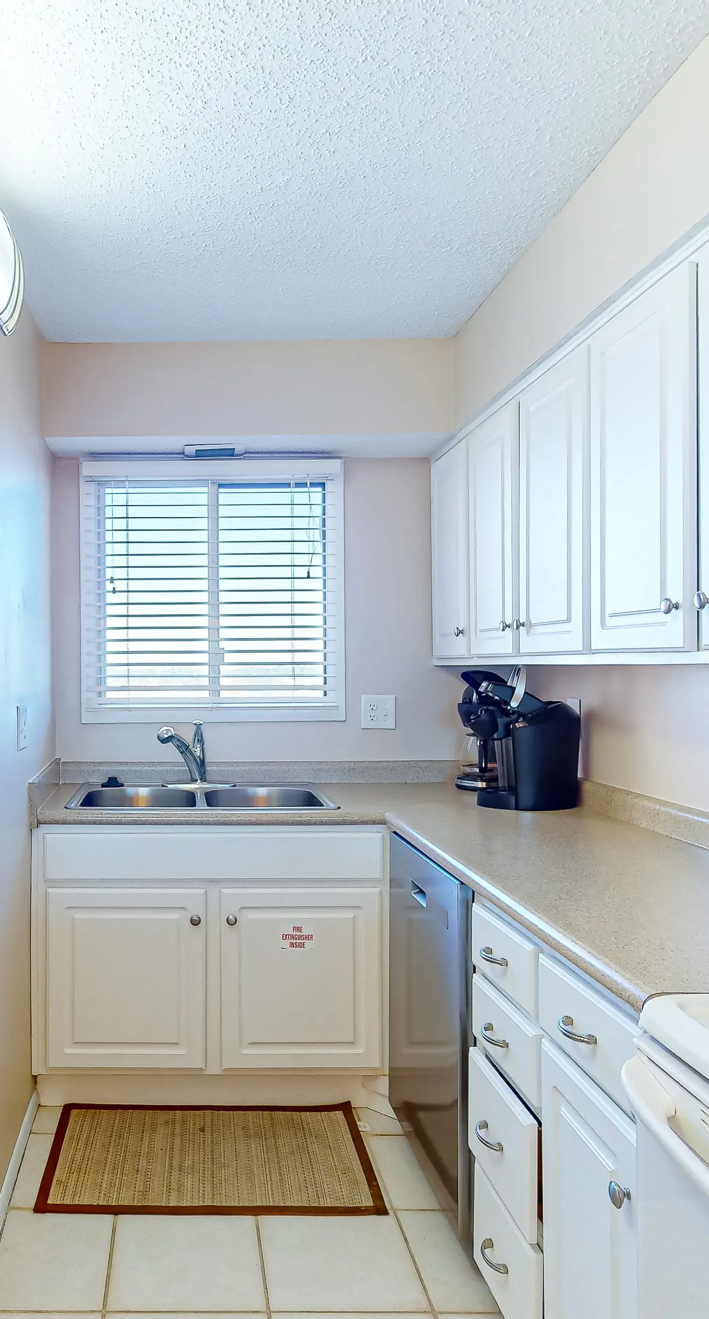 Stunning beachfront condo w/ beach access, shared pool, & private balcony