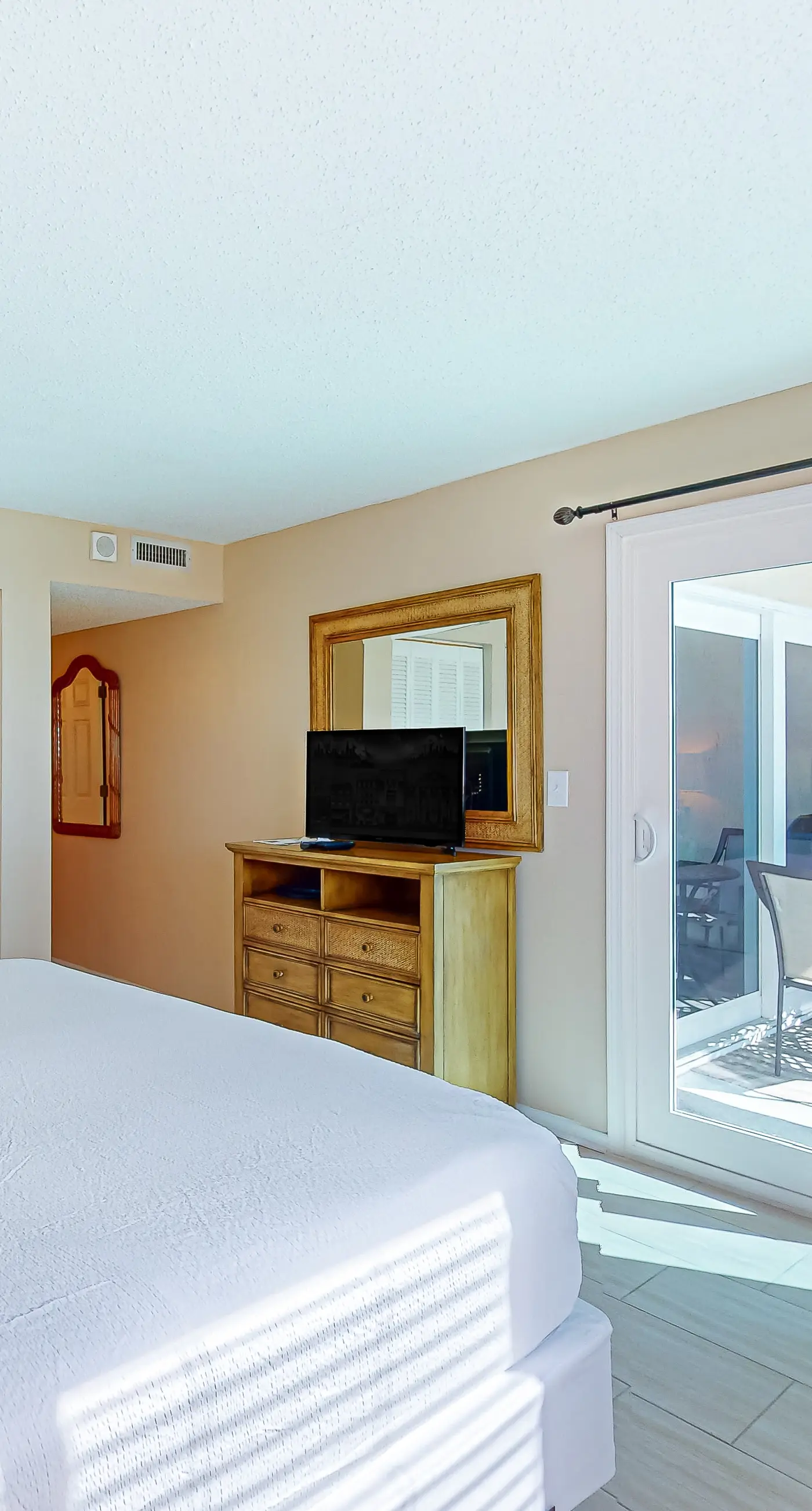 Stunning beachfront condo w/ beach access, shared pool, & private balcony