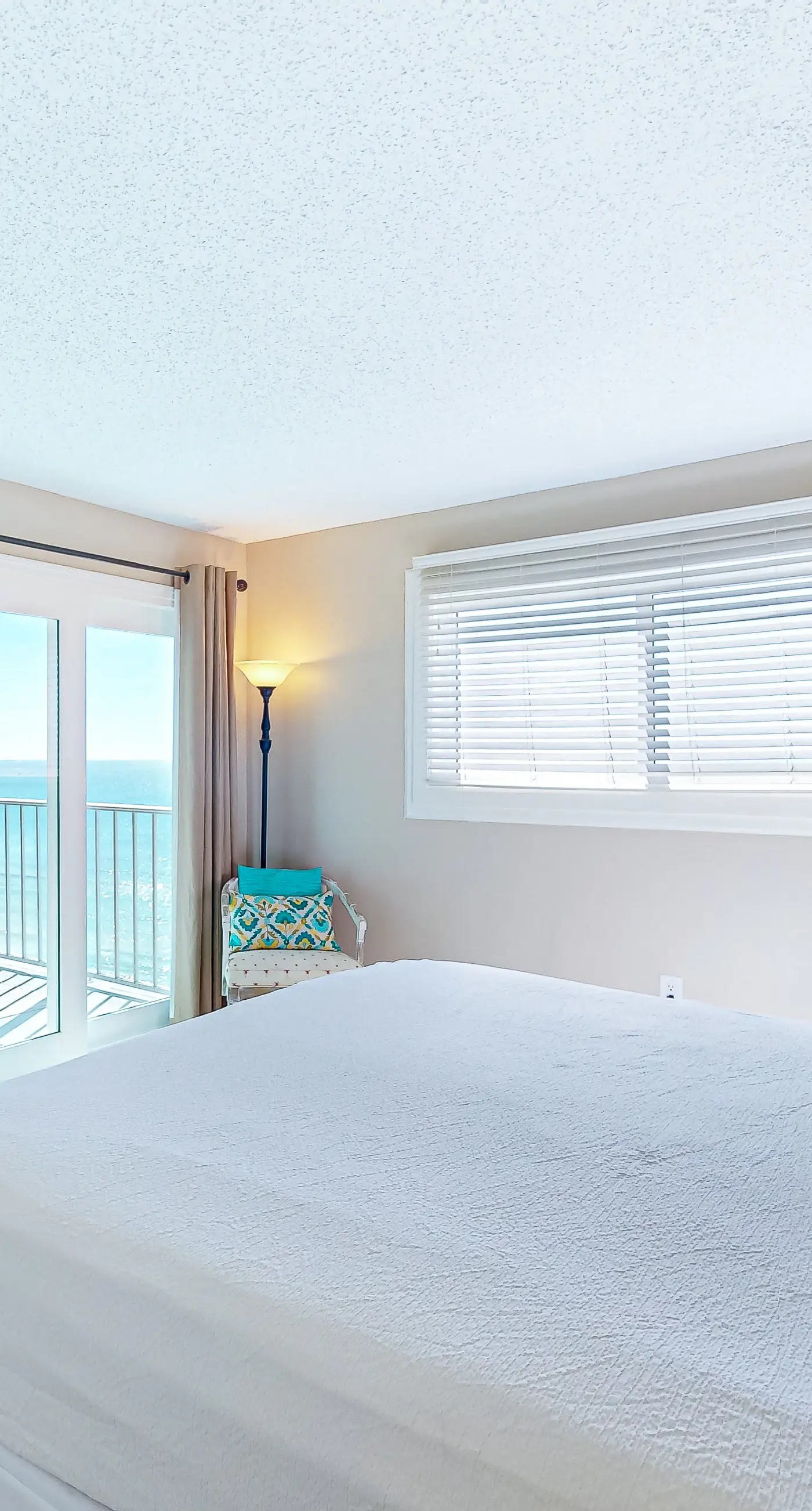 Stunning beachfront condo w/ beach access, shared pool, & private balcony