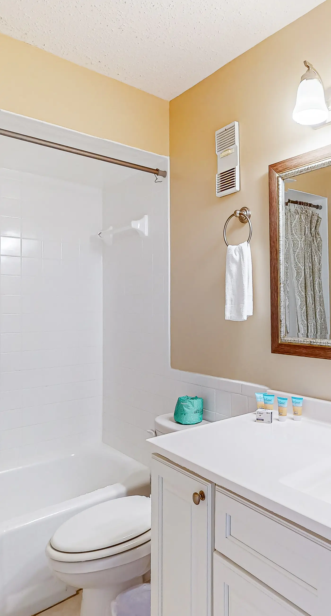 Stunning beachfront condo w/ beach access, shared pool, & private balcony