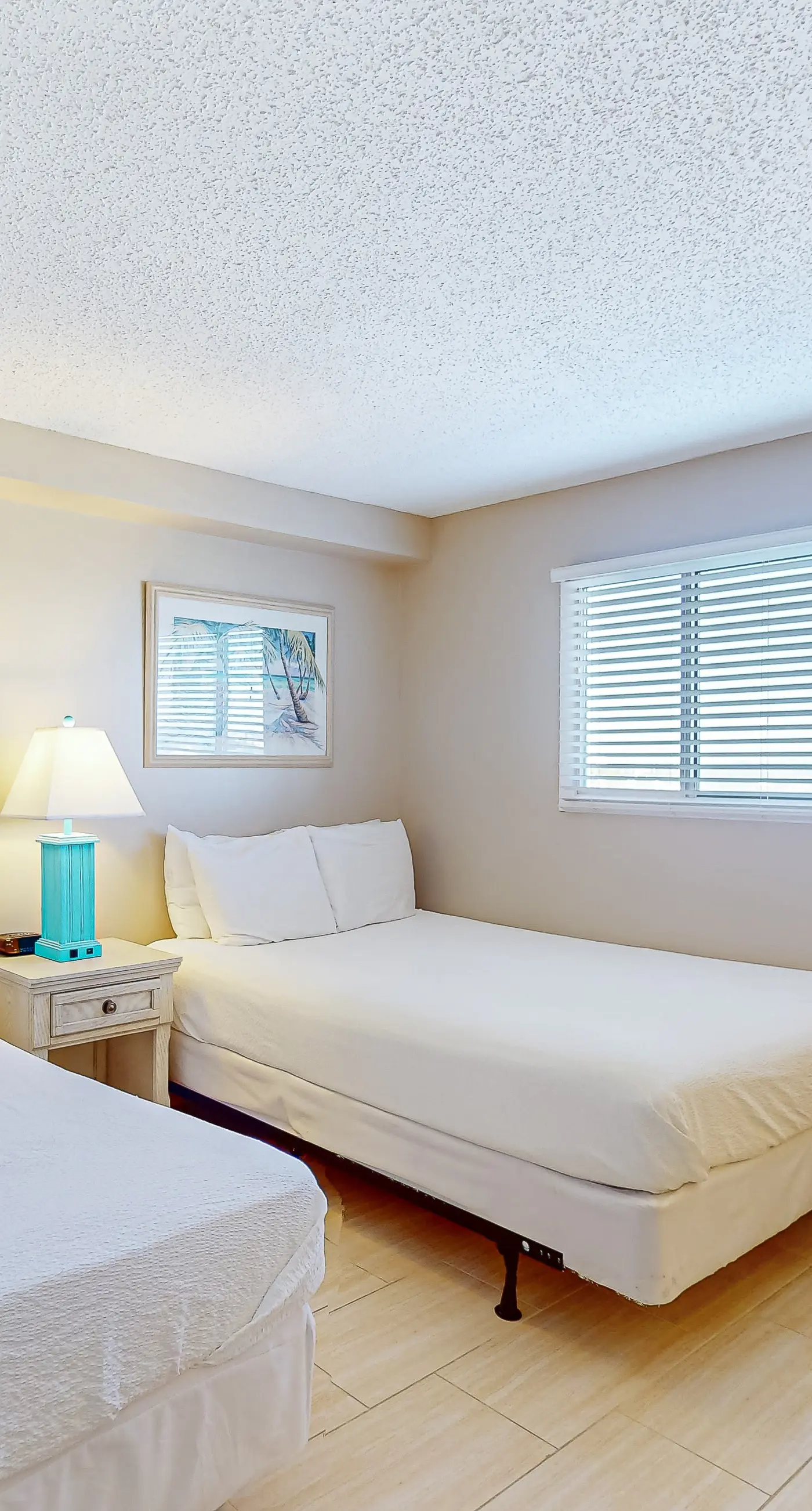 Stunning beachfront condo w/ beach access, shared pool, & private balcony