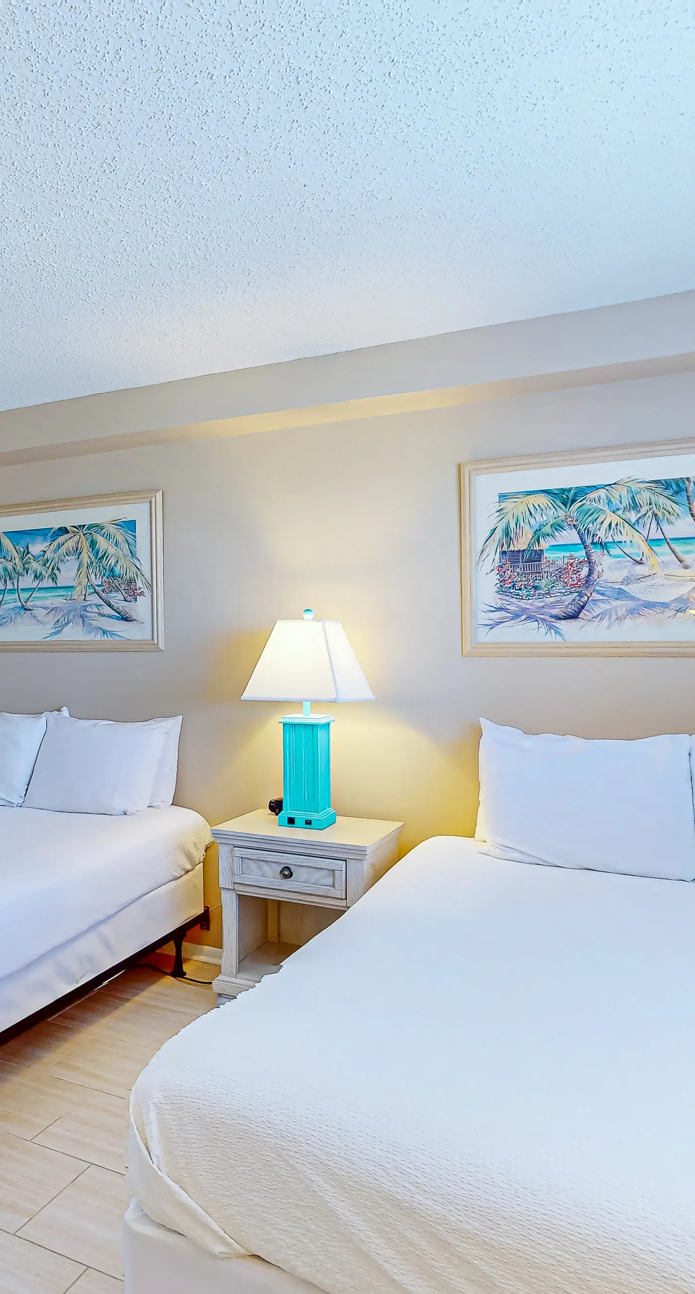 Stunning beachfront condo w/ beach access, shared pool, & private balcony