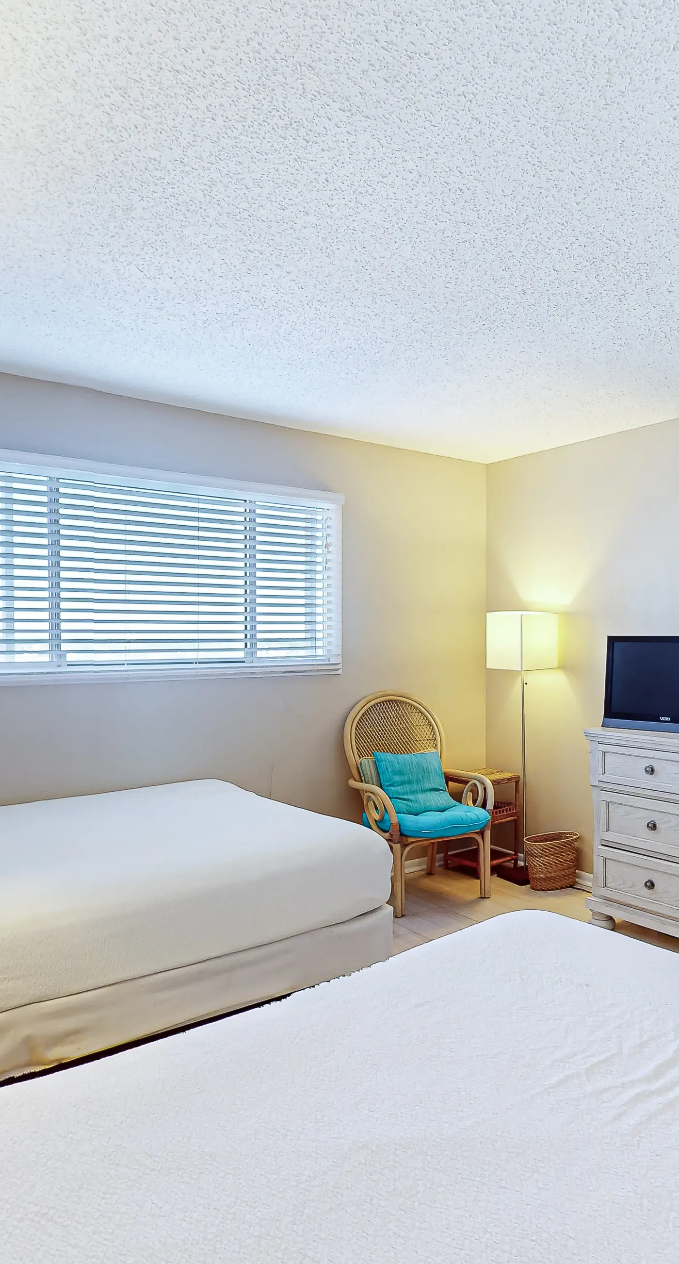 Stunning beachfront condo w/ beach access, shared pool, & private balcony