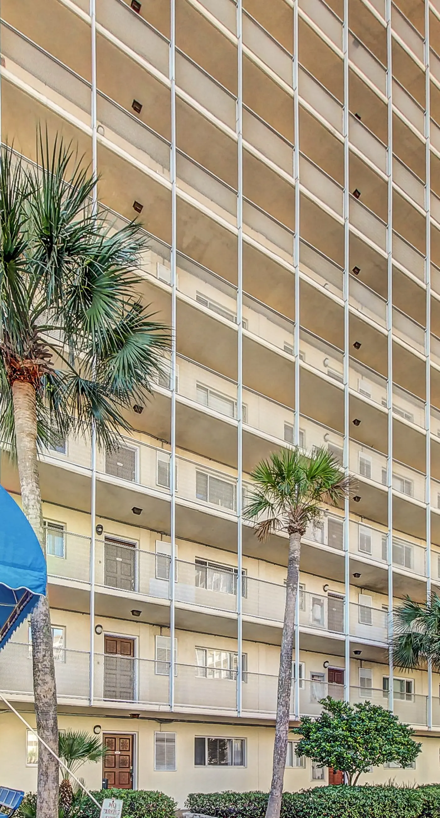 Stunning beachfront condo w/ beach access, shared pool, & private balcony