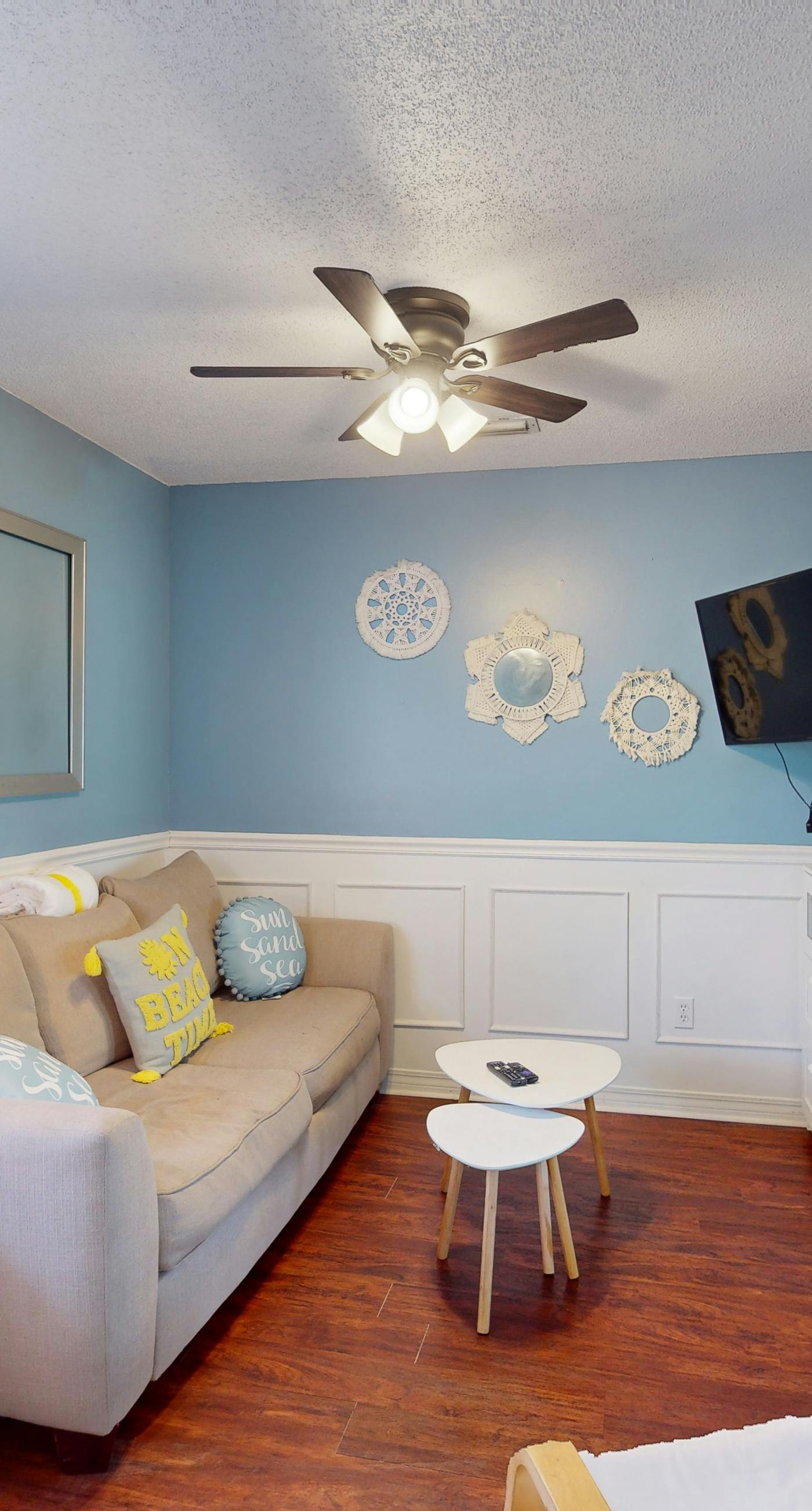 Gulf-view 2-story condo near the beach with porch, streaming, W/D, & central AC