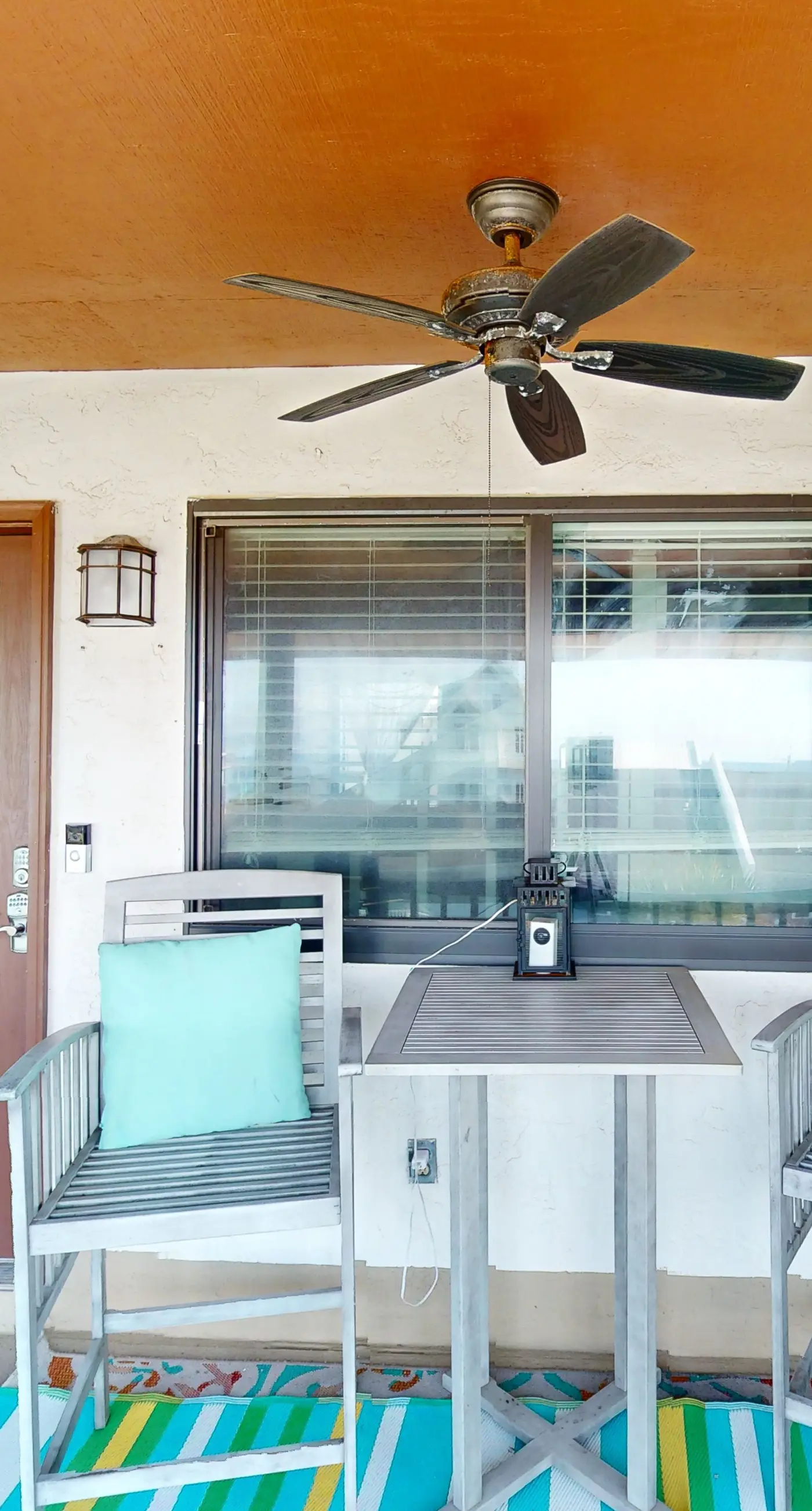 Gulf-view 2-story condo near the beach with porch, streaming, W/D, & central AC