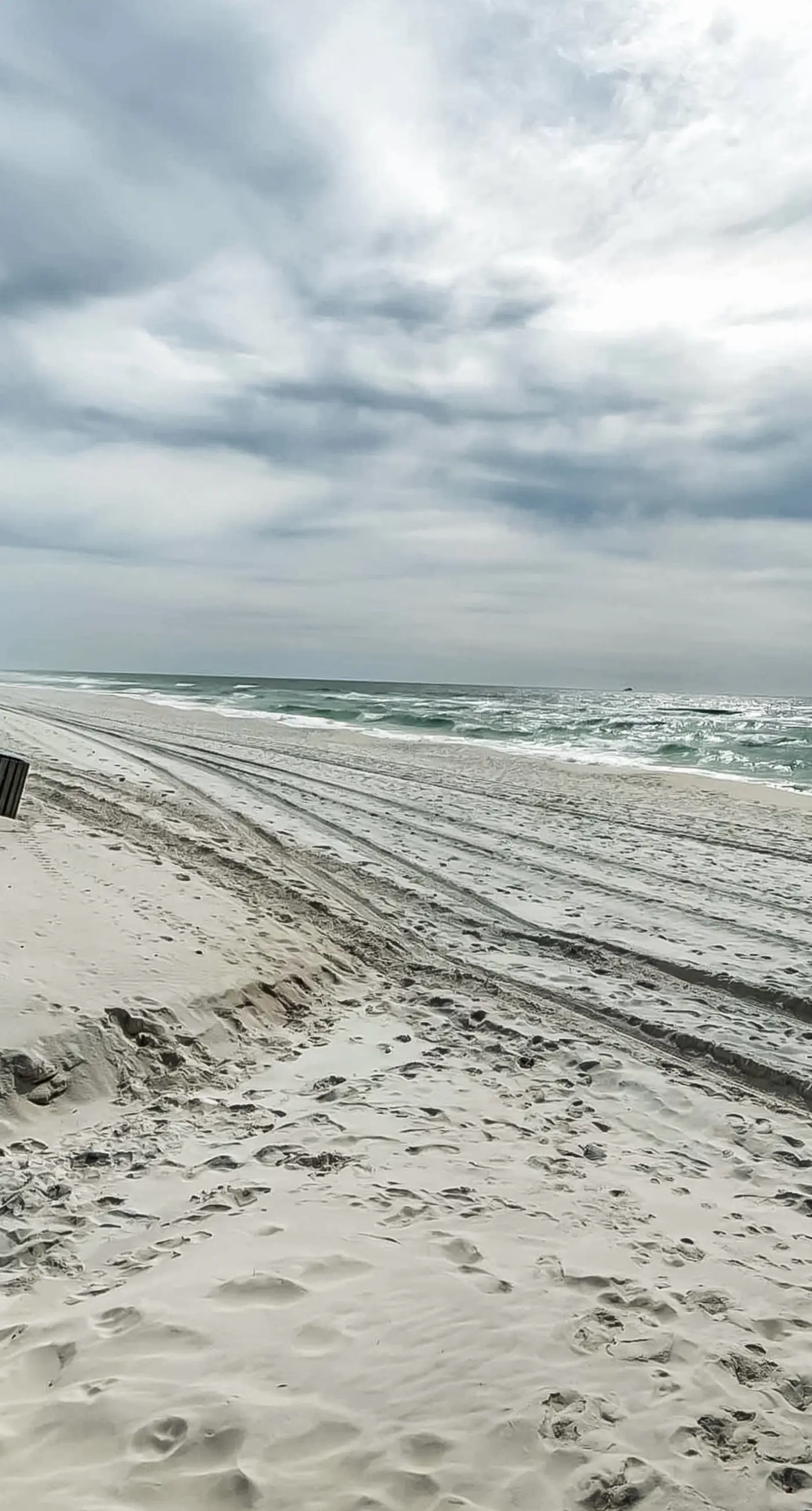 Gulf-view 2-story condo near the beach with porch, streaming, W/D, & central AC