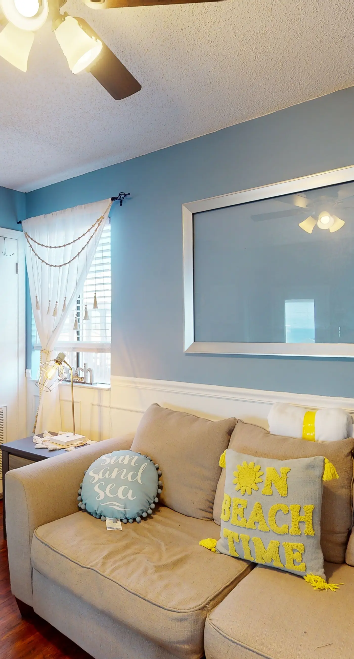 Gulf-view 2-story condo near the beach with porch, streaming, W/D, & central AC