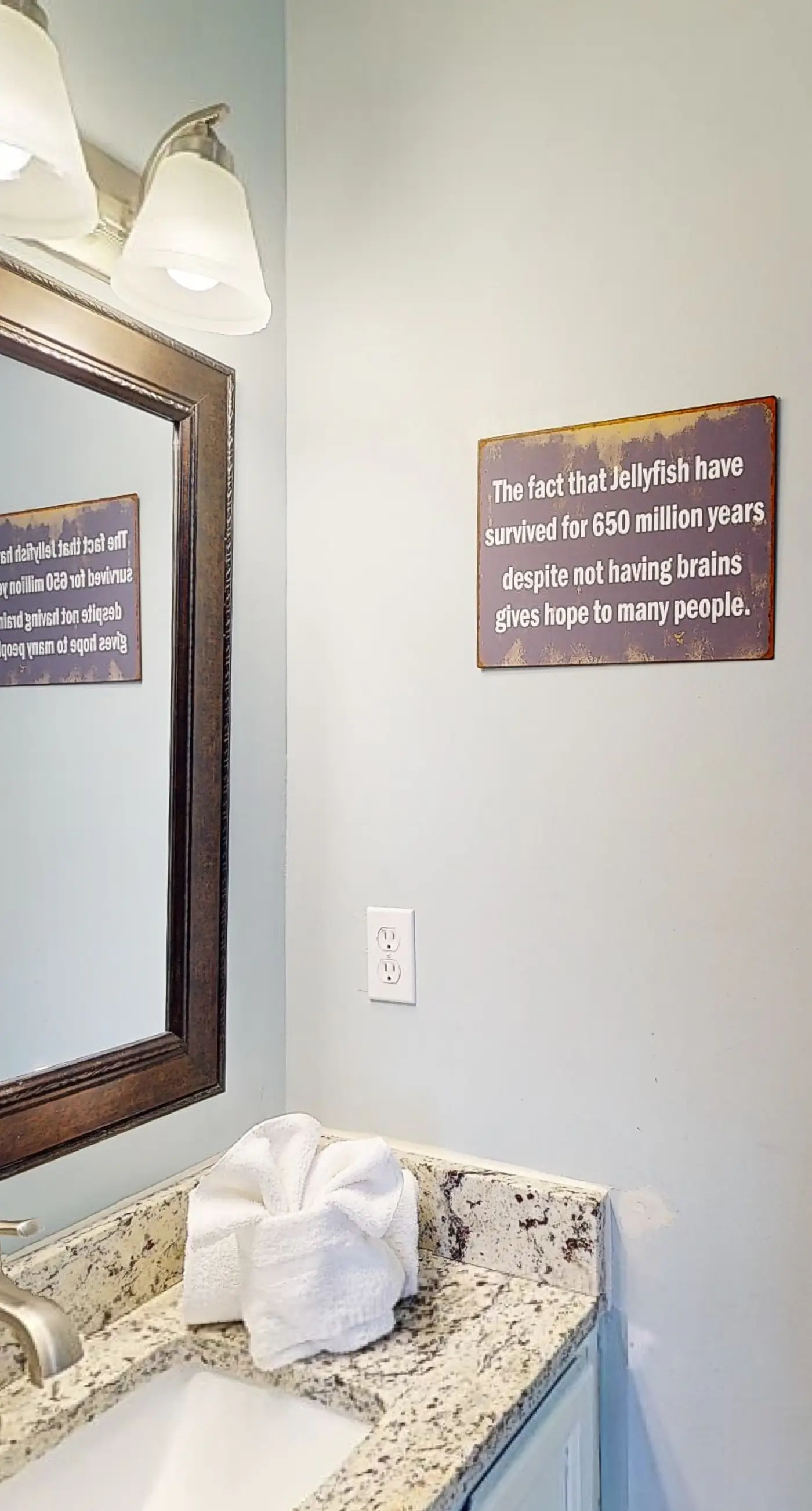 Gulf-view 2-story condo near the beach with porch, streaming, W/D, & central AC