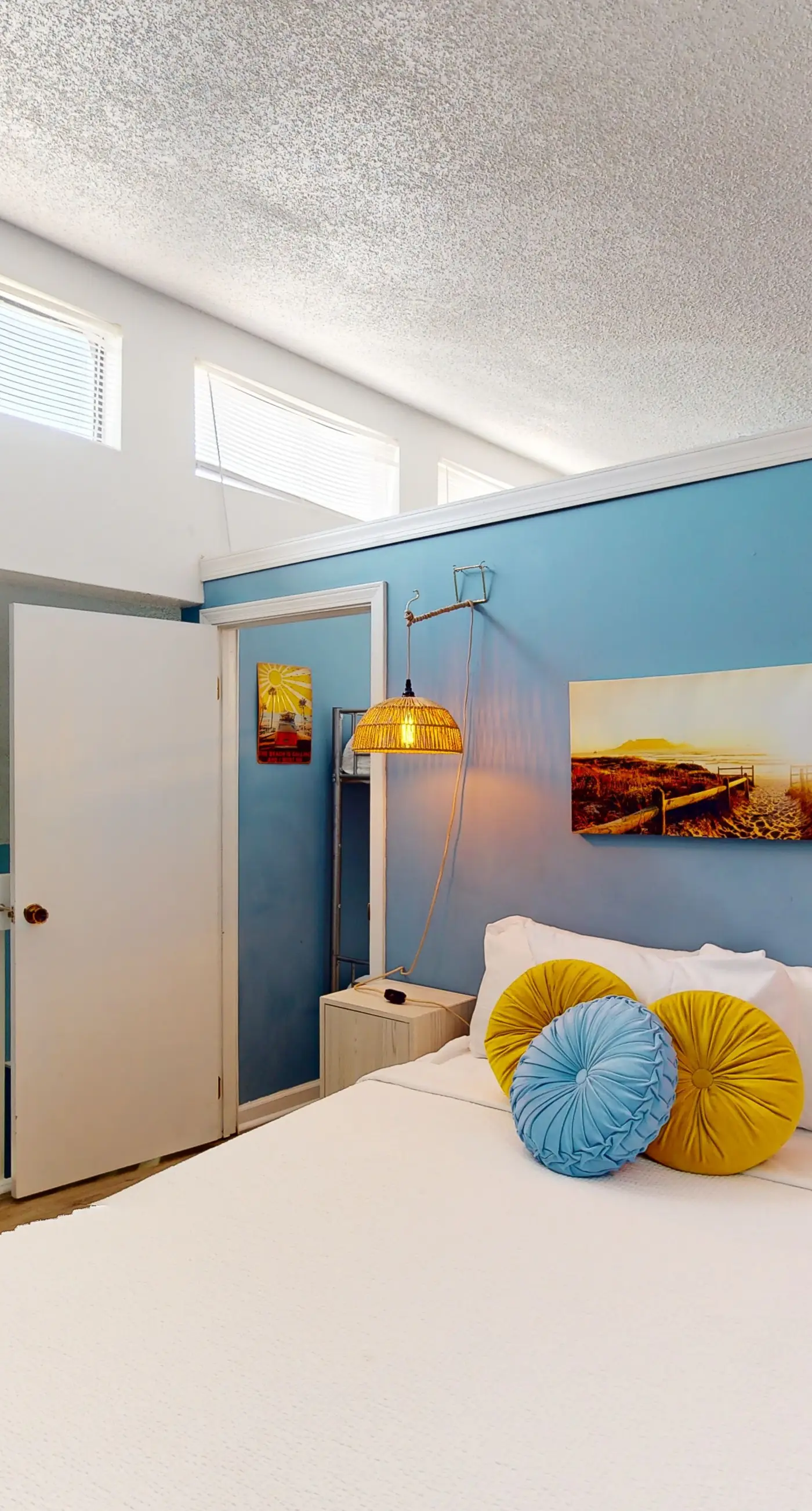 Gulf-view 2-story condo near the beach with porch, streaming, W/D, & central AC