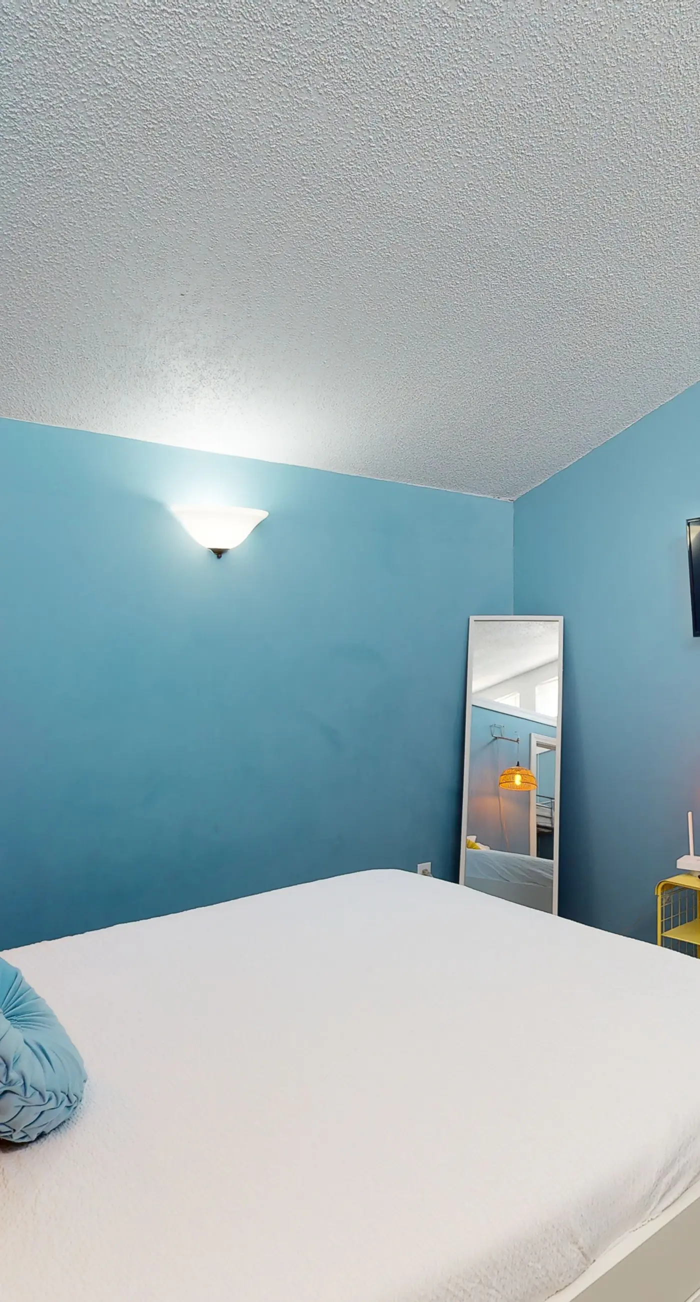 Gulf-view 2-story condo near the beach with porch, streaming, W/D, & central AC