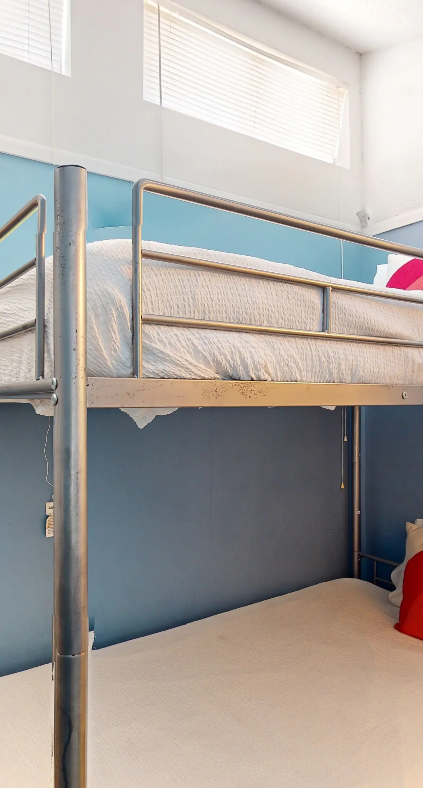 Gulf-view 2-story condo near the beach with porch, streaming, W/D, & central AC