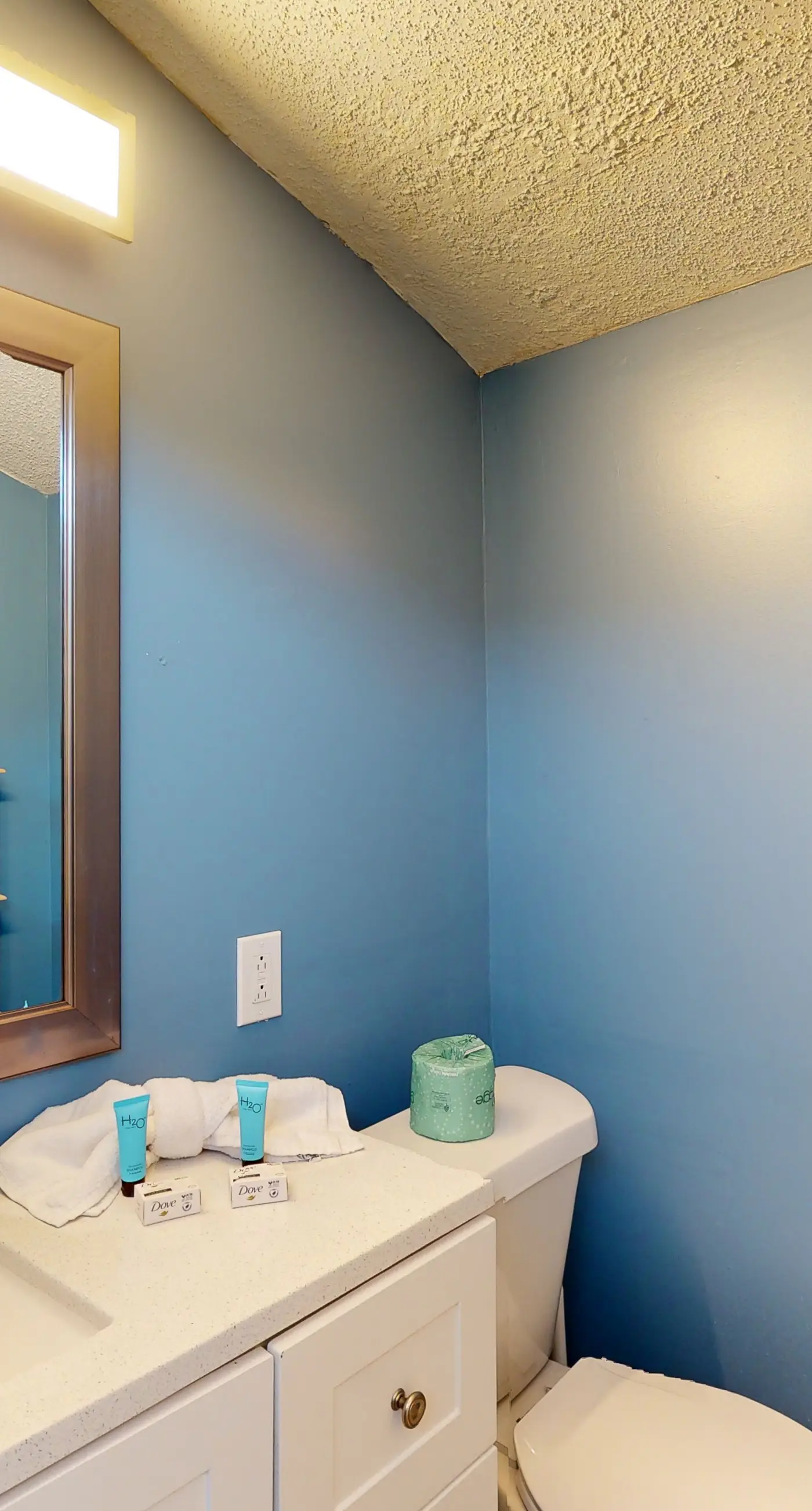 Gulf-view 2-story condo near the beach with porch, streaming, W/D, & central AC