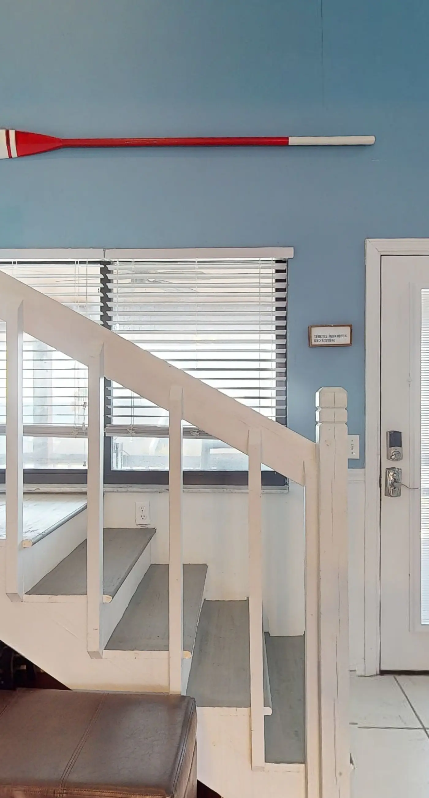 Gulf-view 2-story condo near the beach with porch, streaming, W/D, & central AC