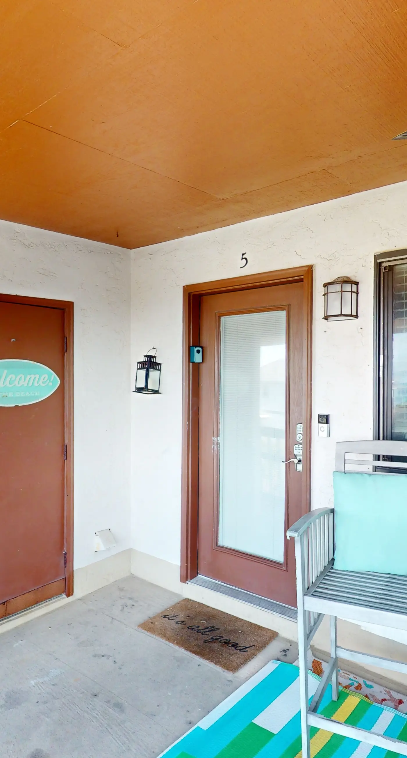 Gulf-view 2-story condo near the beach with porch, streaming, W/D, & central AC