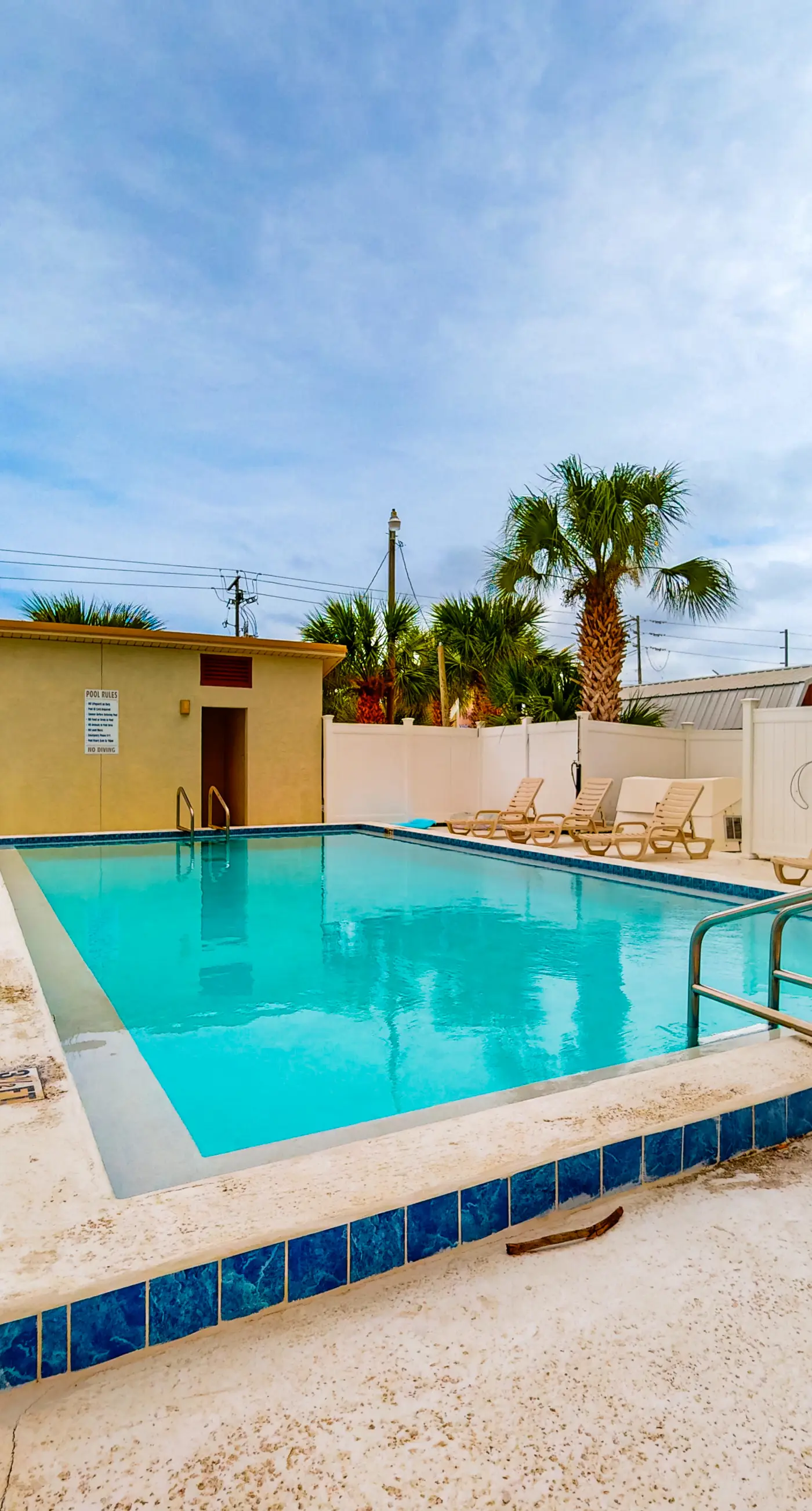 Gulf-view 2-story condo near the beach with porch, streaming, W/D, & central AC