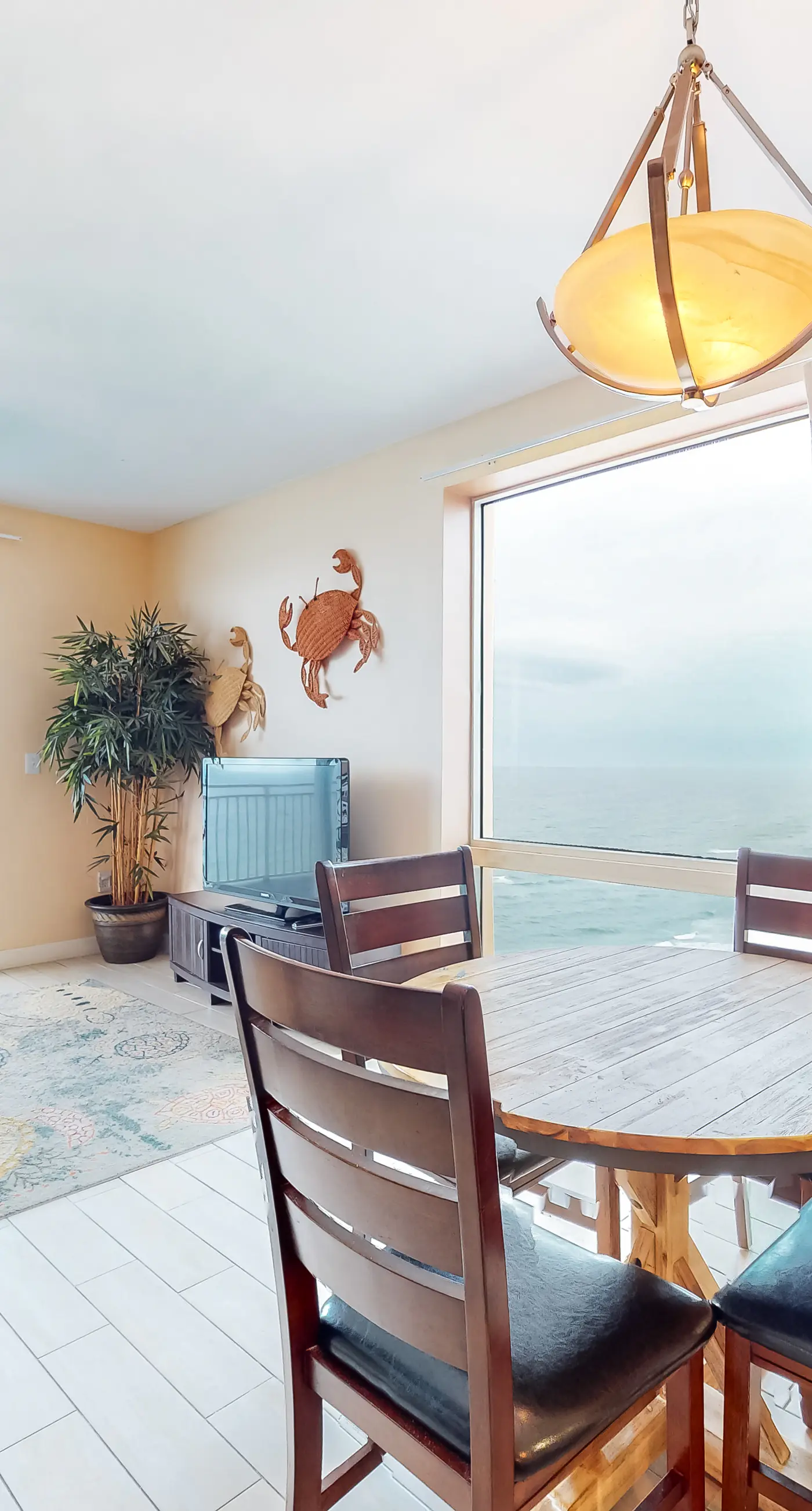 Superb beach living at lovely waterfront condo with pools, a gym, & hot tub