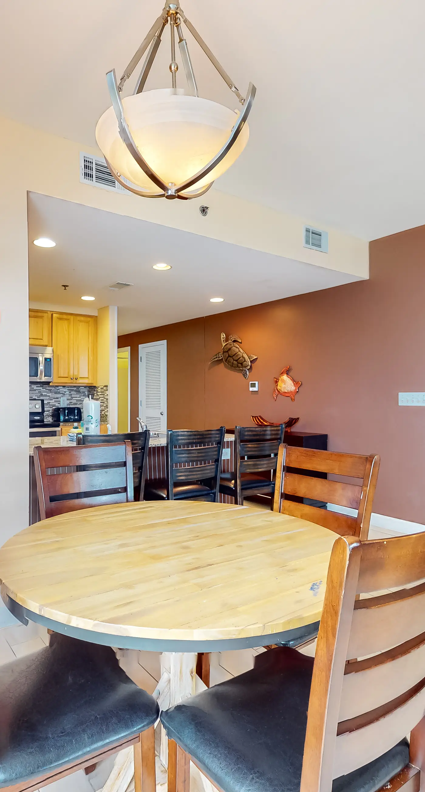 Superb beach living at lovely waterfront condo with pools, a gym, & hot tub