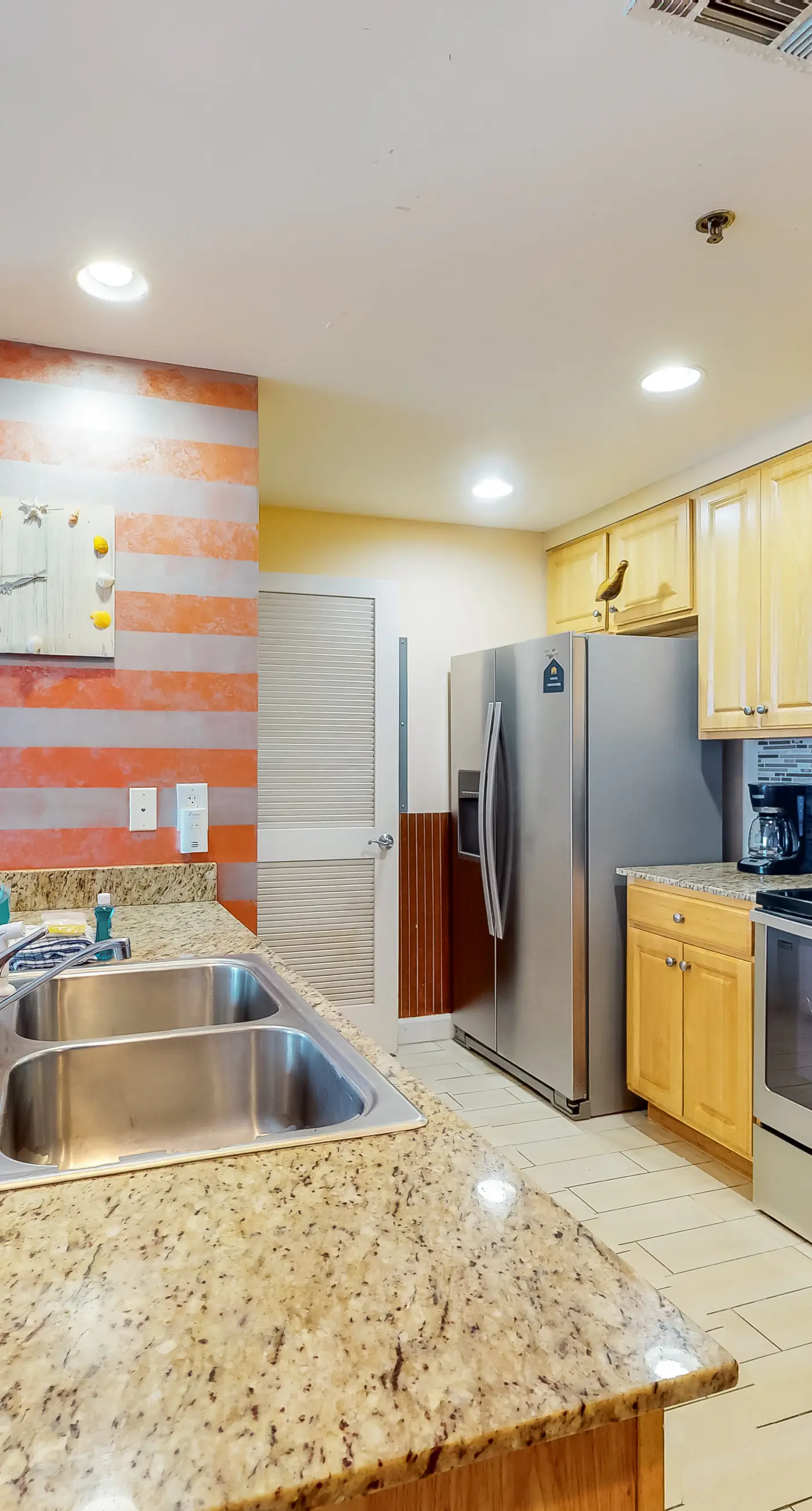 Superb beach living at lovely waterfront condo with pools, a gym, & hot tub