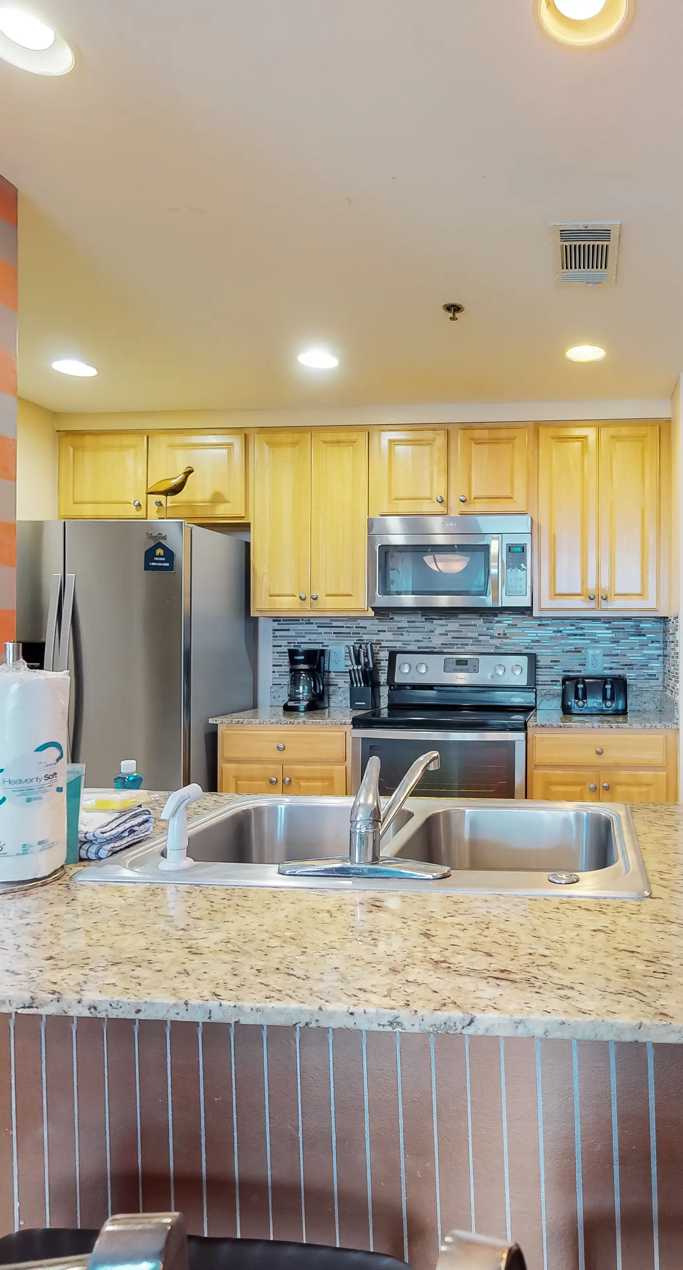Superb beach living at lovely waterfront condo with pools, a gym, & hot tub
