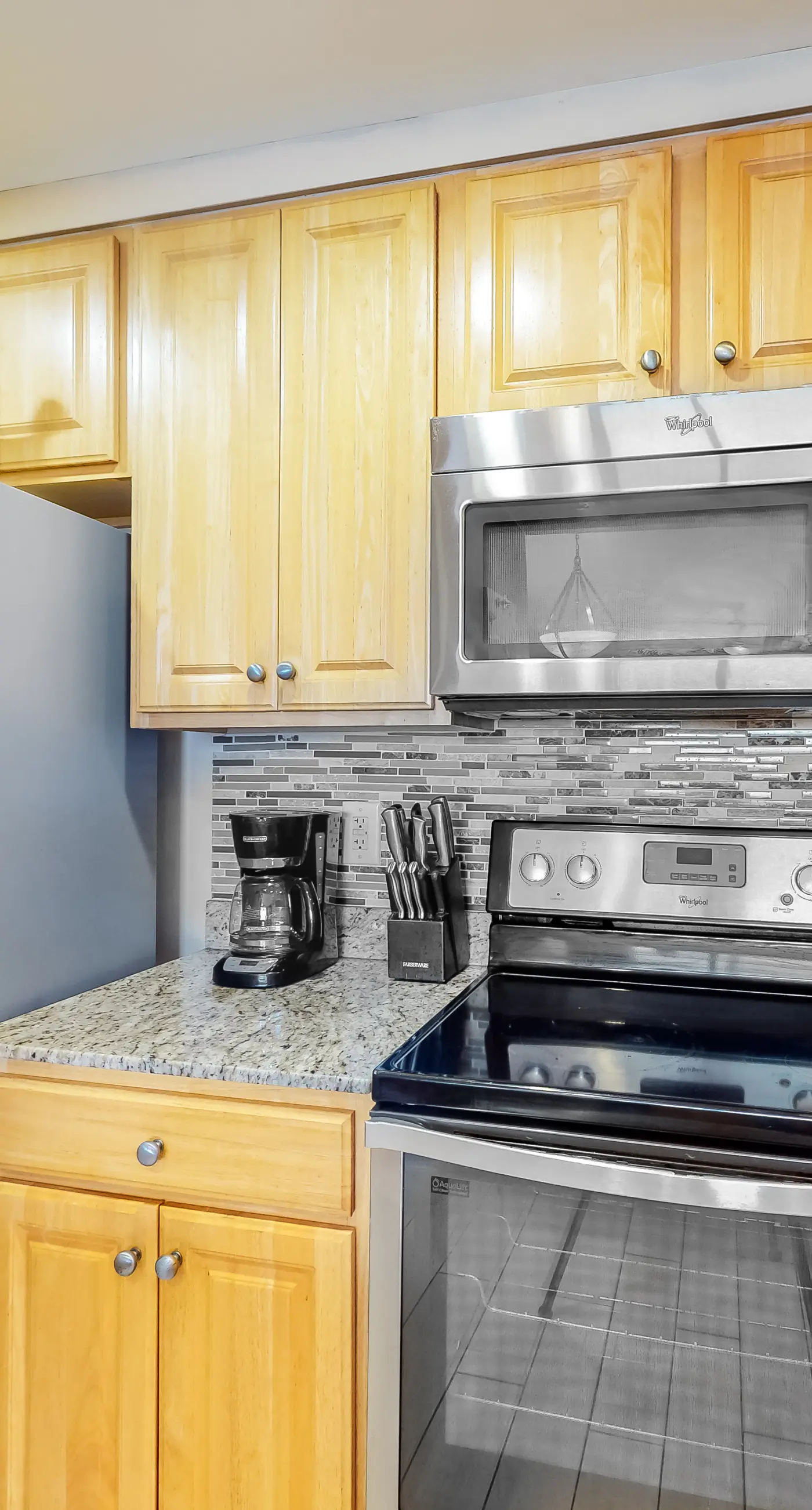 Superb beach living at lovely waterfront condo with pools, a gym, & hot tub