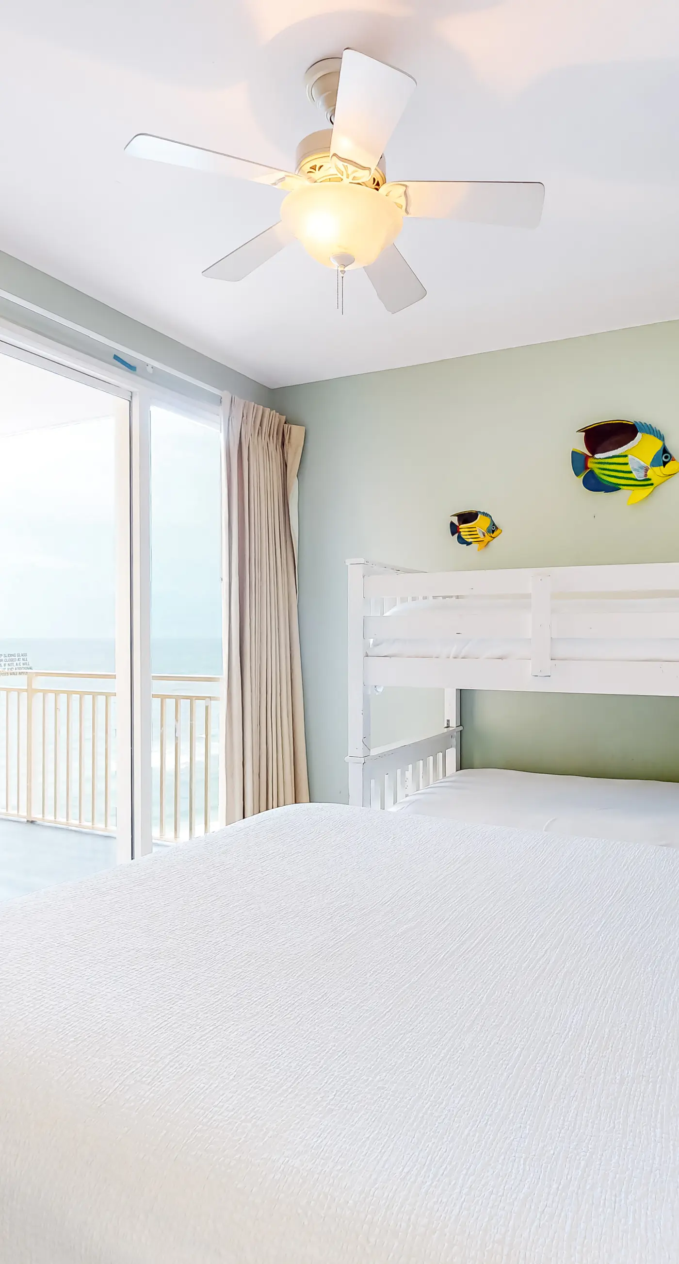 Superb beach living at lovely waterfront condo with pools, a gym, & hot tub