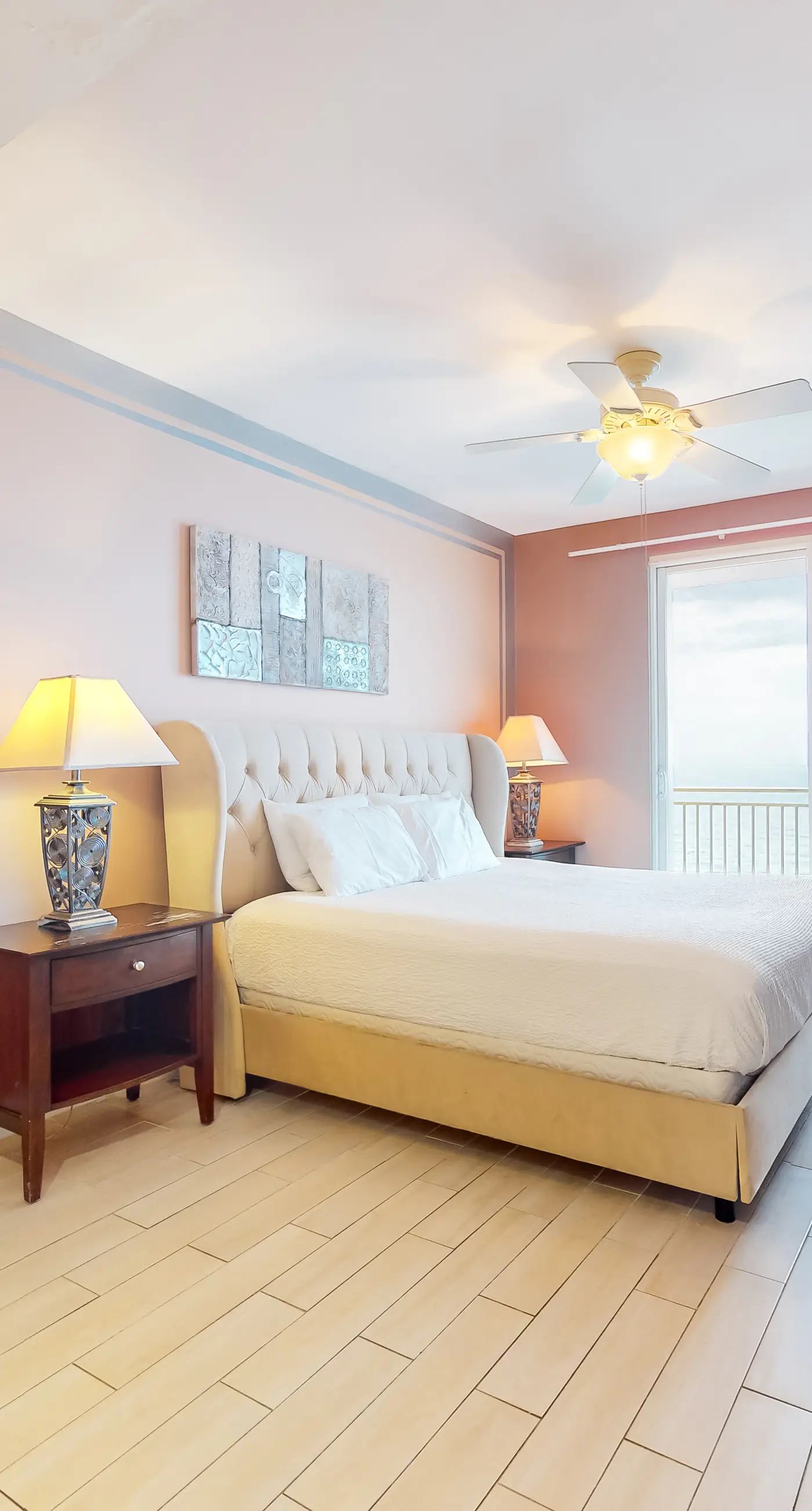 Superb beach living at lovely waterfront condo with pools, a gym, & hot tub