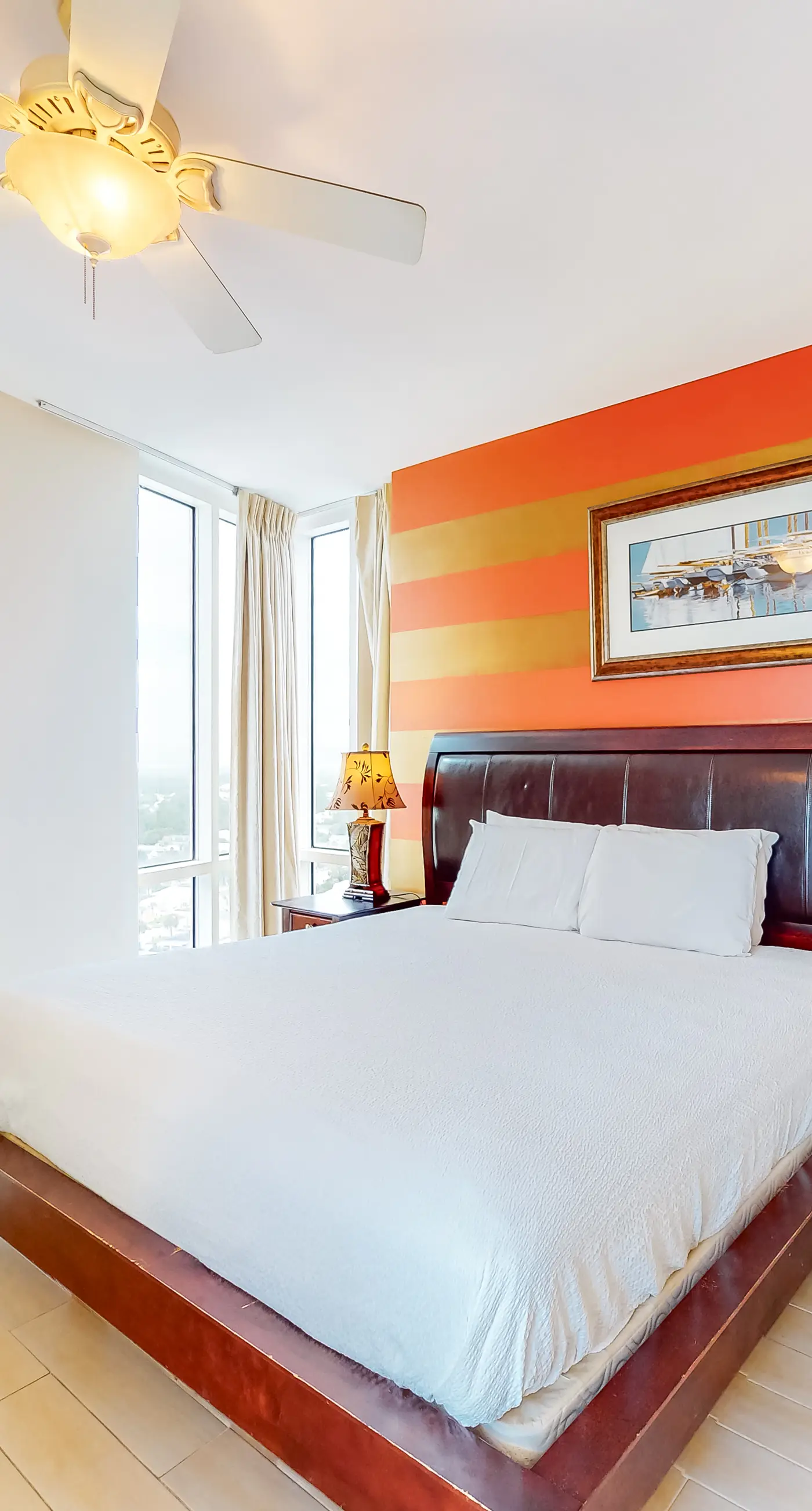 Superb beach living at lovely waterfront condo with pools, a gym, & hot tub