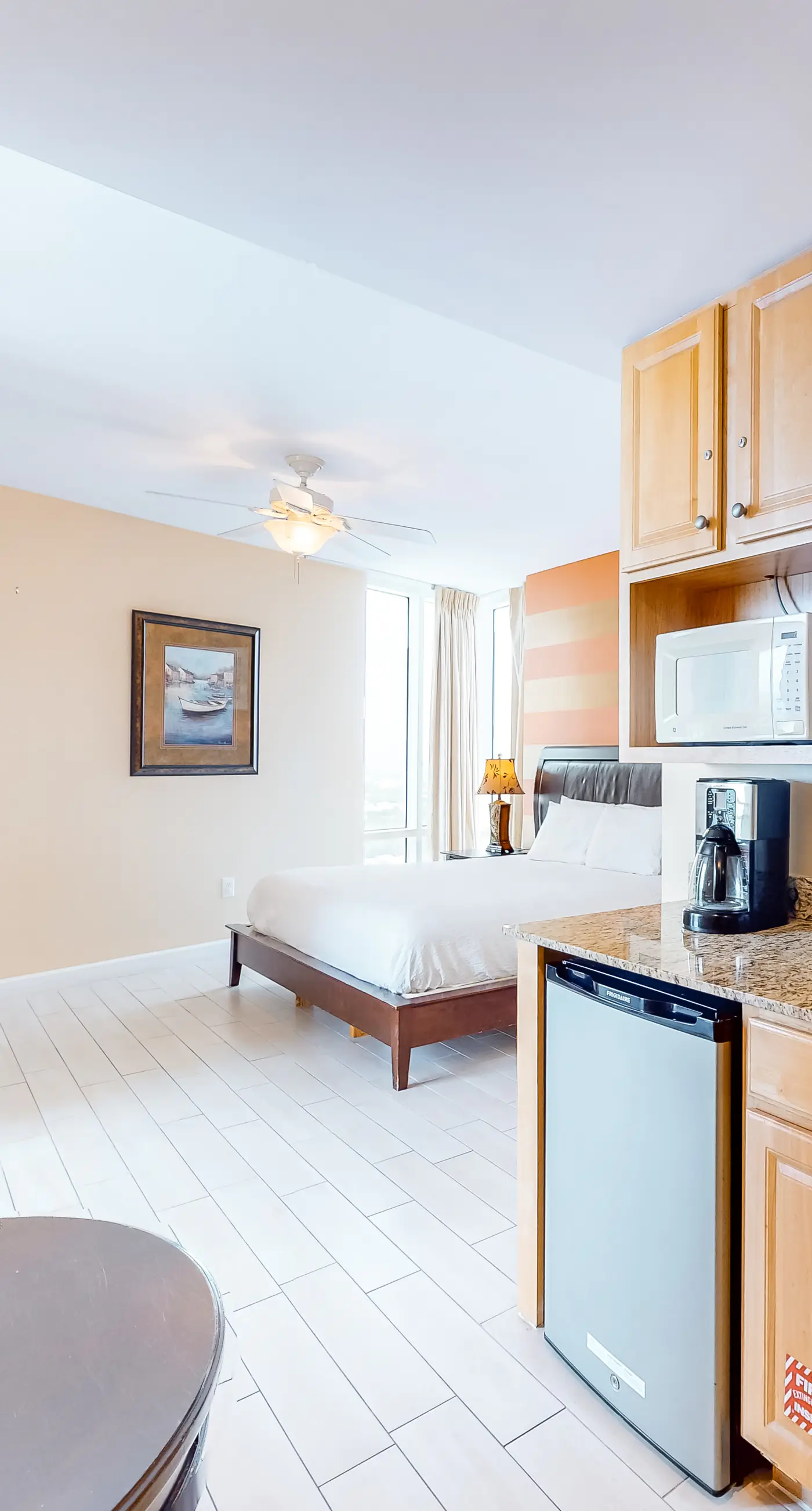Superb beach living at lovely waterfront condo with pools, a gym, & hot tub