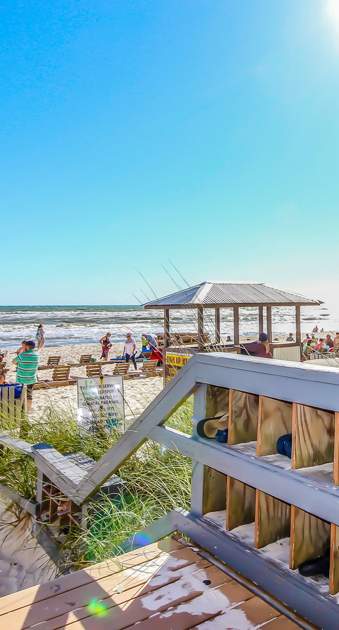 Superb beach living at lovely waterfront condo with pools, a gym, & hot tub