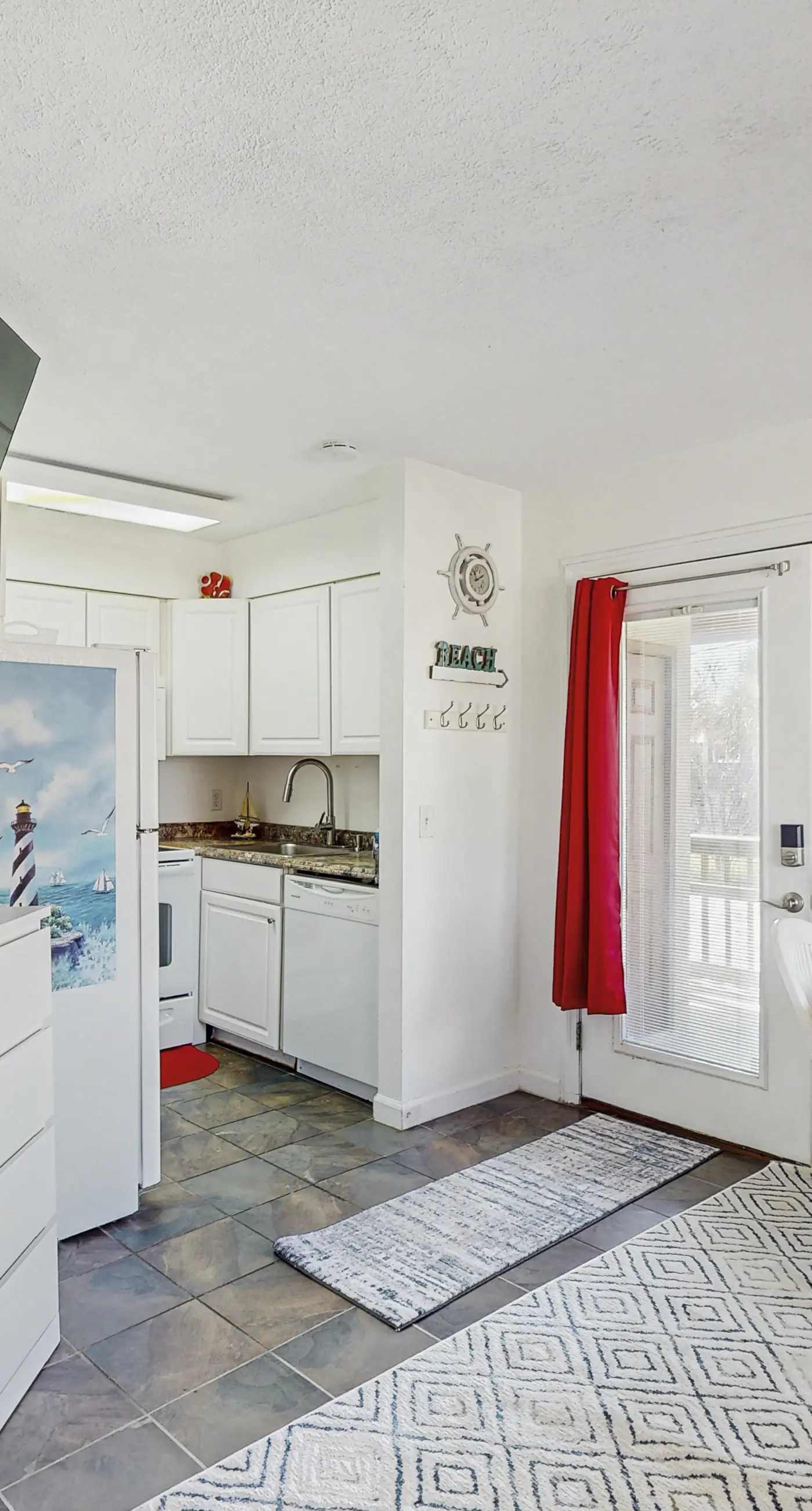 Peaceful studio beach condo with shared pool & full W/D