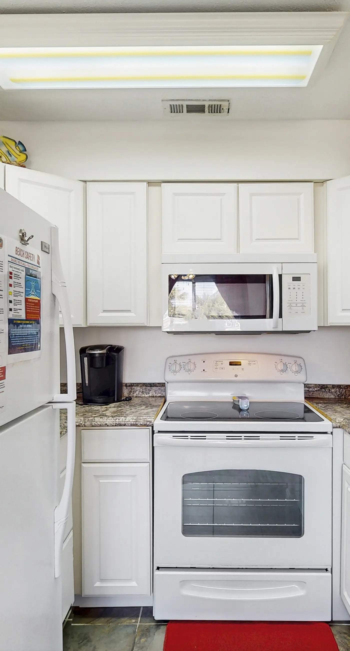 Peaceful studio beach condo with shared pool & full W/D