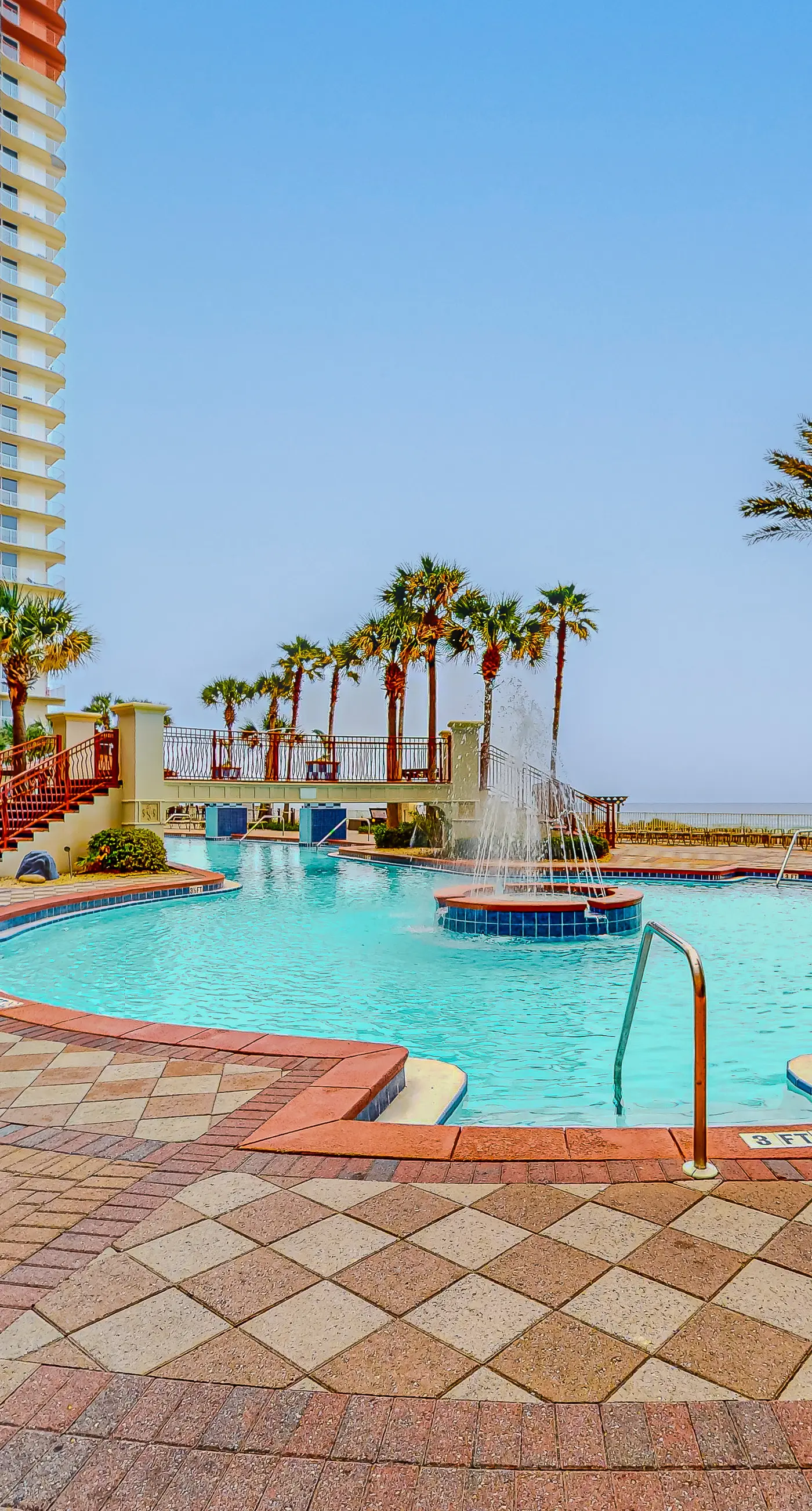 Gulf-front condo with sweeping views, pools, hot tubs, & easy beach